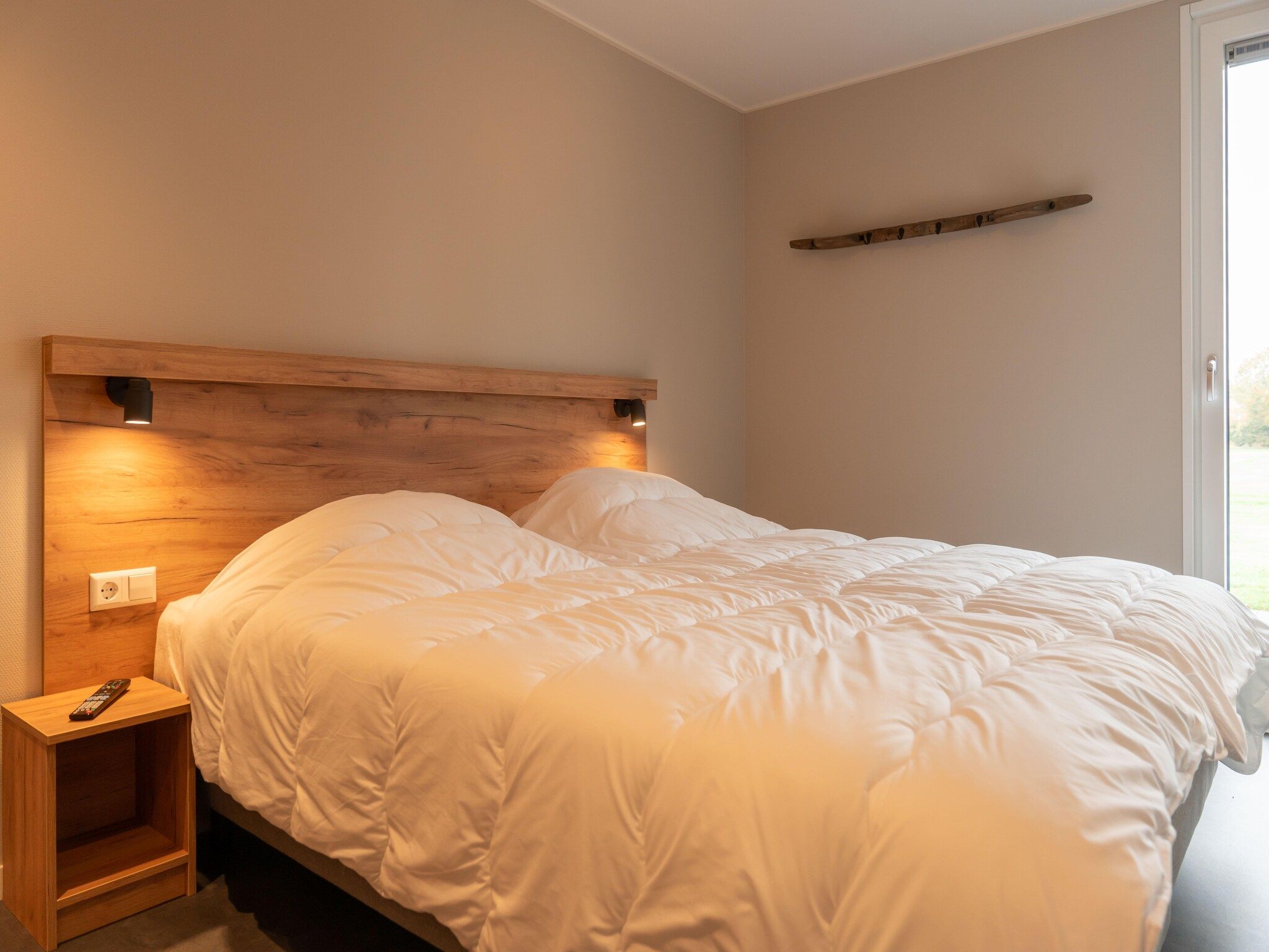 Een slaapkamer van Yn't Bosk in Sint Nicolaasga