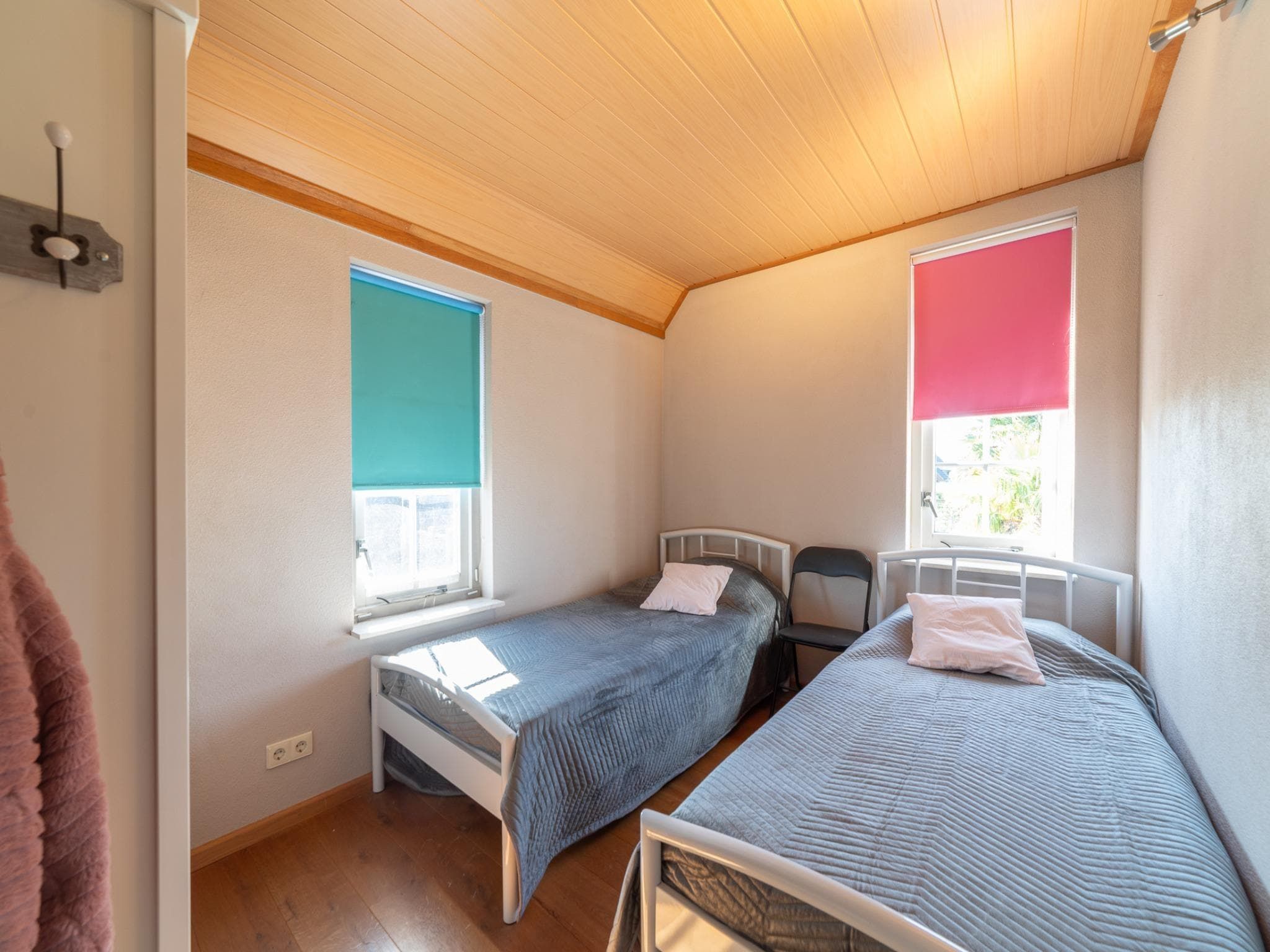 Een slaapkamer van Villapark De Oesterbaai 134 in Wemeldinge