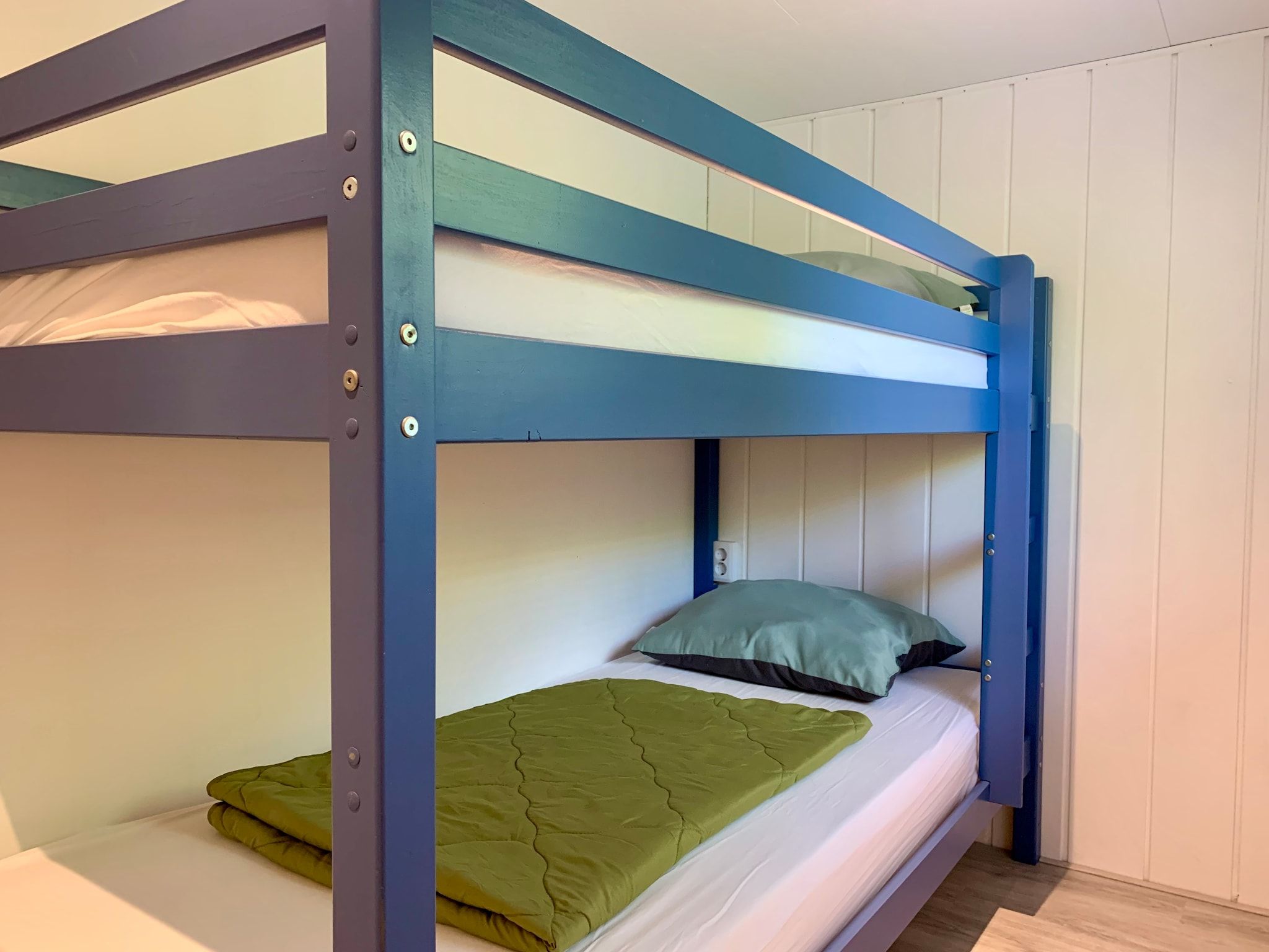 Een slaapkamer van Campanula 211 in Sint Maartenszee