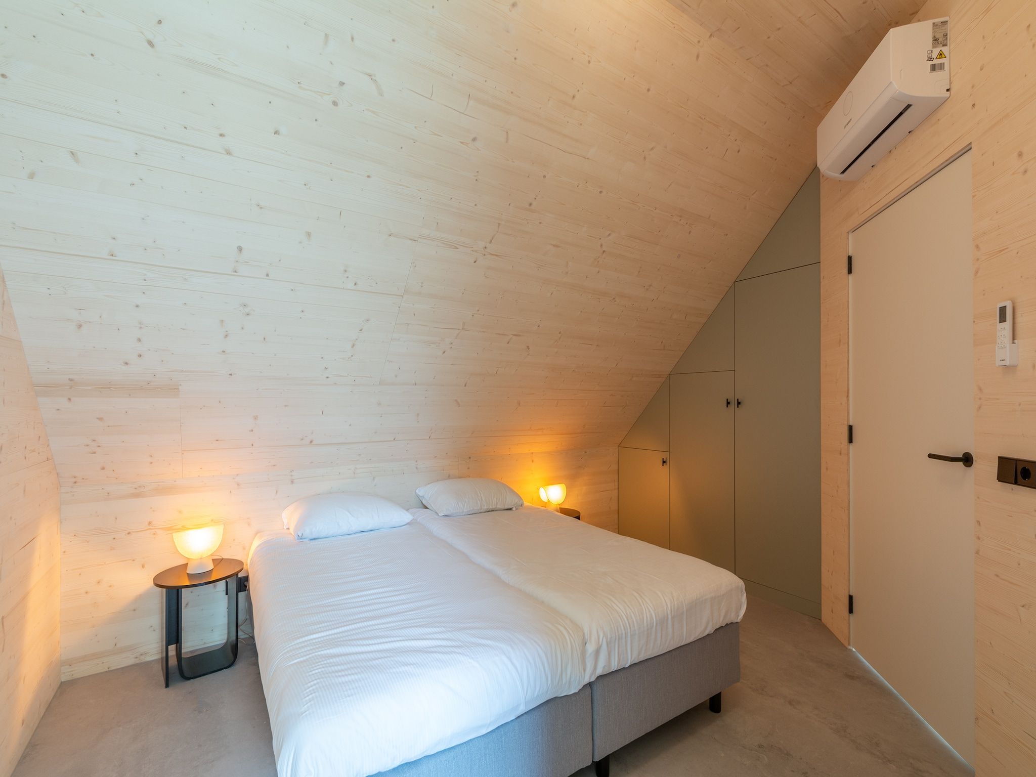Een slaapkamer van Belkmer Beachhouse in Sint Maartenszee
