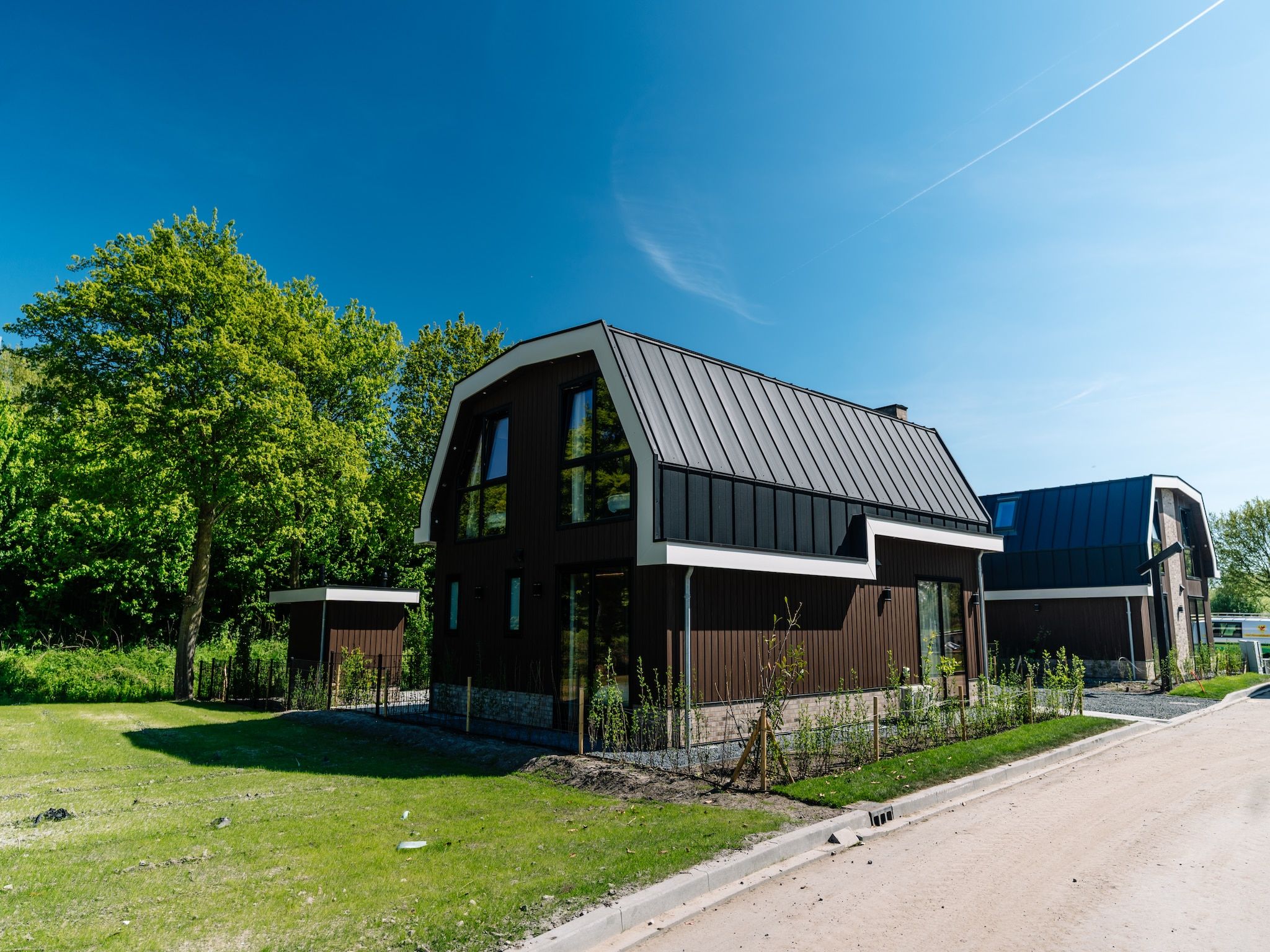 De buitenkant van Villa Watergloed | 10 personen in Waarland