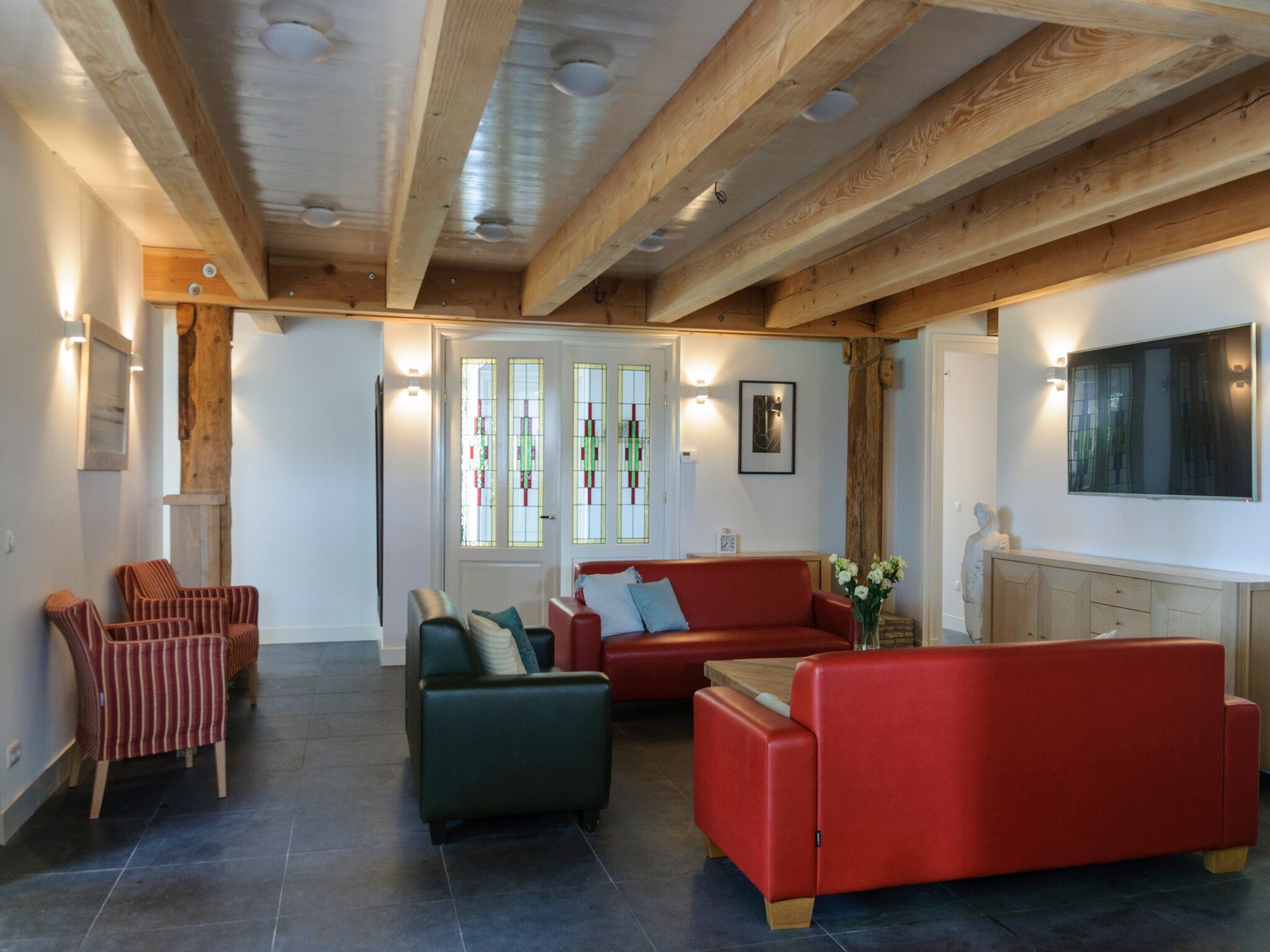 De woonkamer van Groepsaccomodatie - Balkenhoeve in Schagen