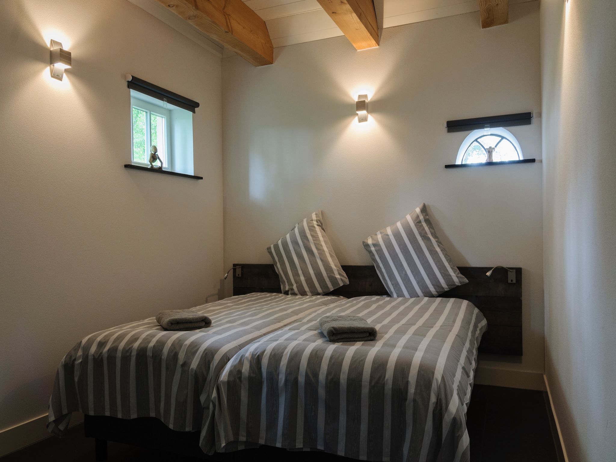 Een slaapkamer van Groepsaccomodatie - Balkenhoeve in Schagen