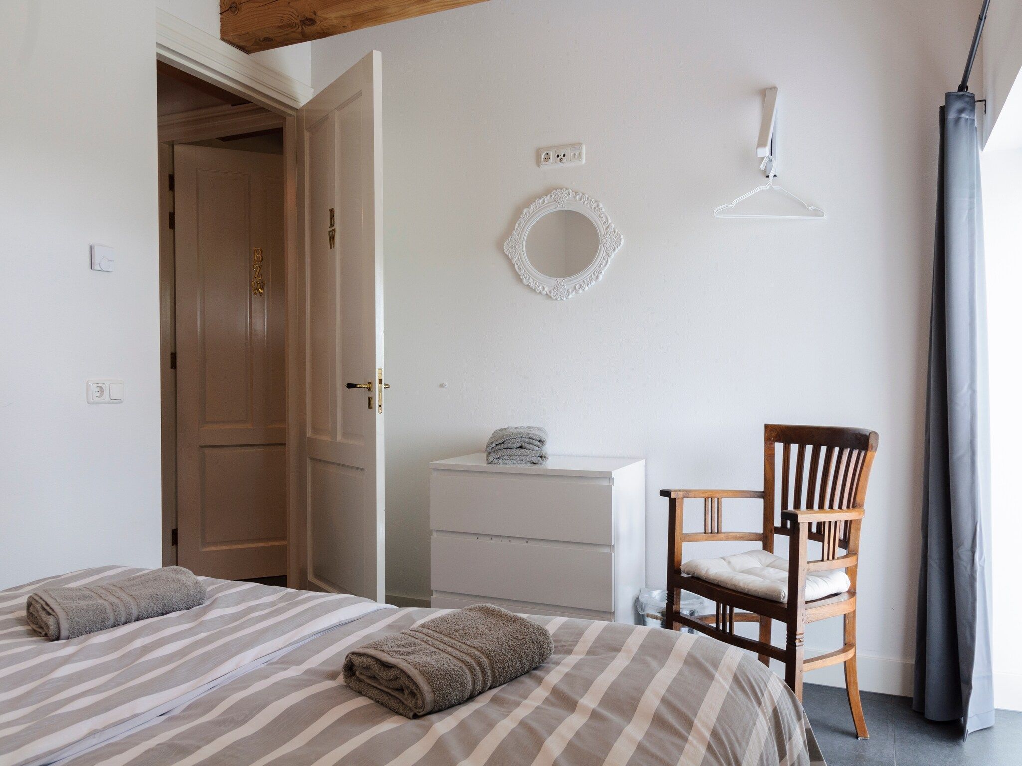 Een slaapkamer van Groepsaccomodatie - Balkenhoeve in Schagen