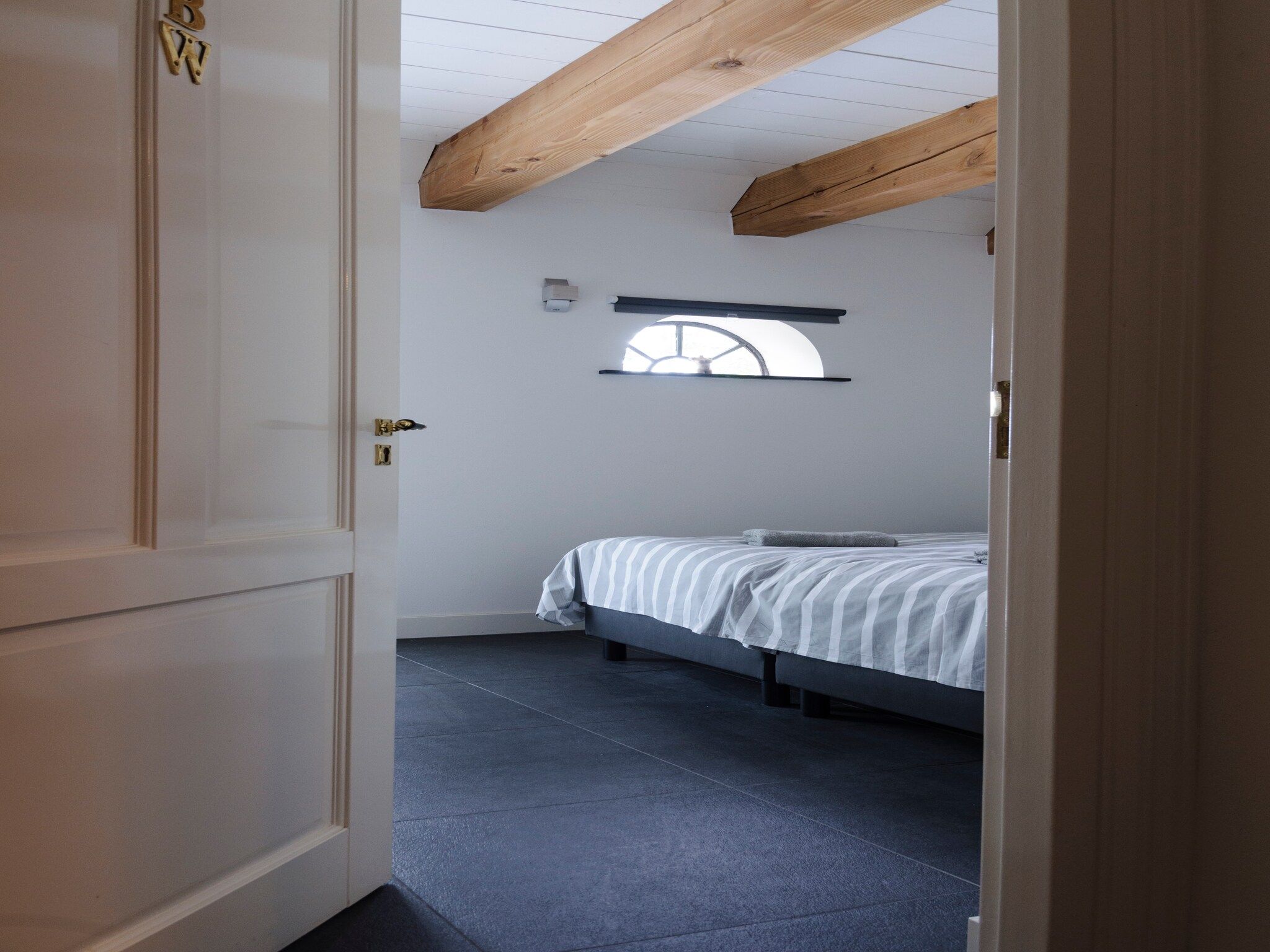 Een slaapkamer van Groepsaccomodatie - Balkenhoeve in Schagen