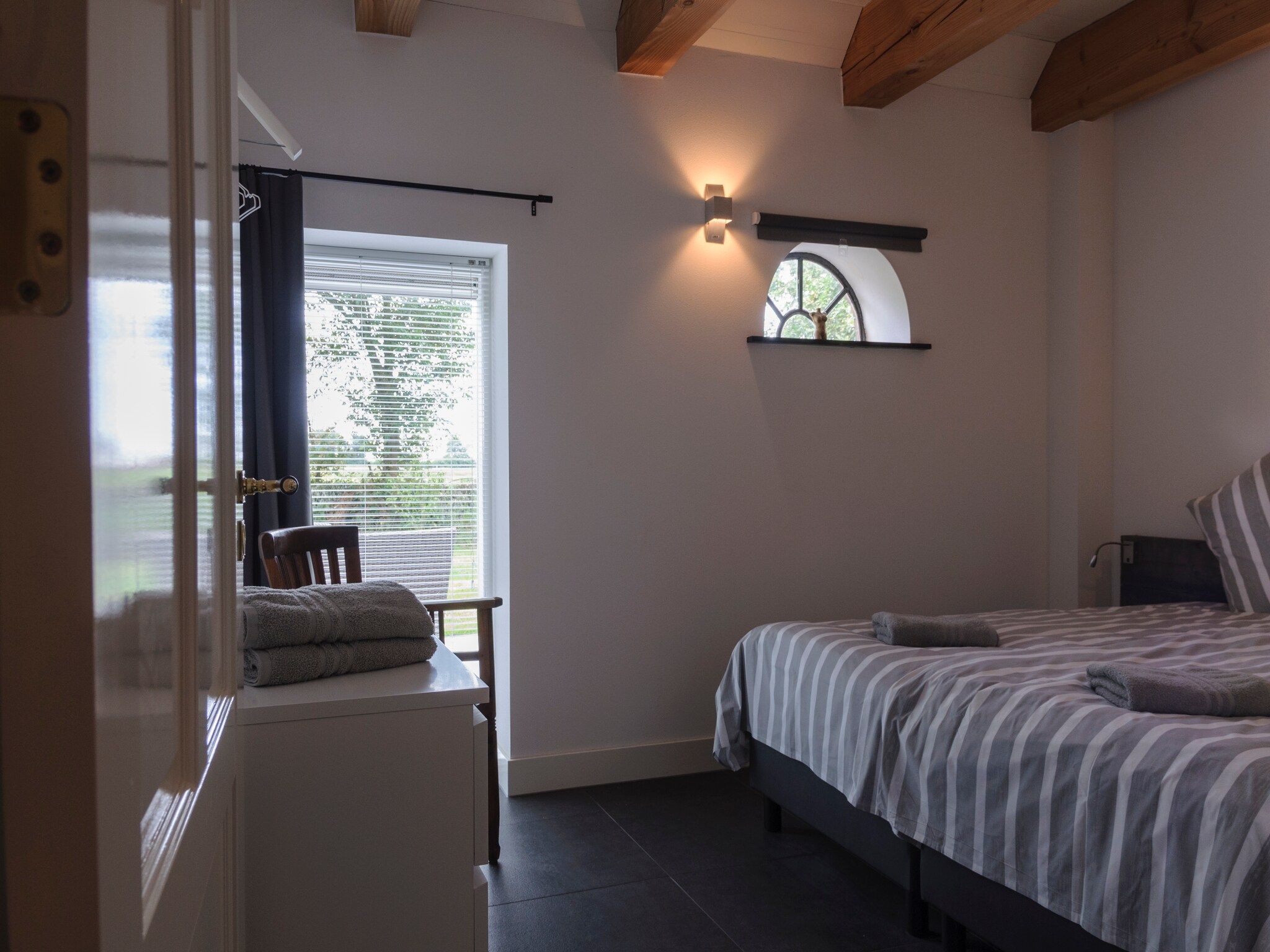 Een slaapkamer van Groepsaccomodatie - Balkenhoeve in Schagen