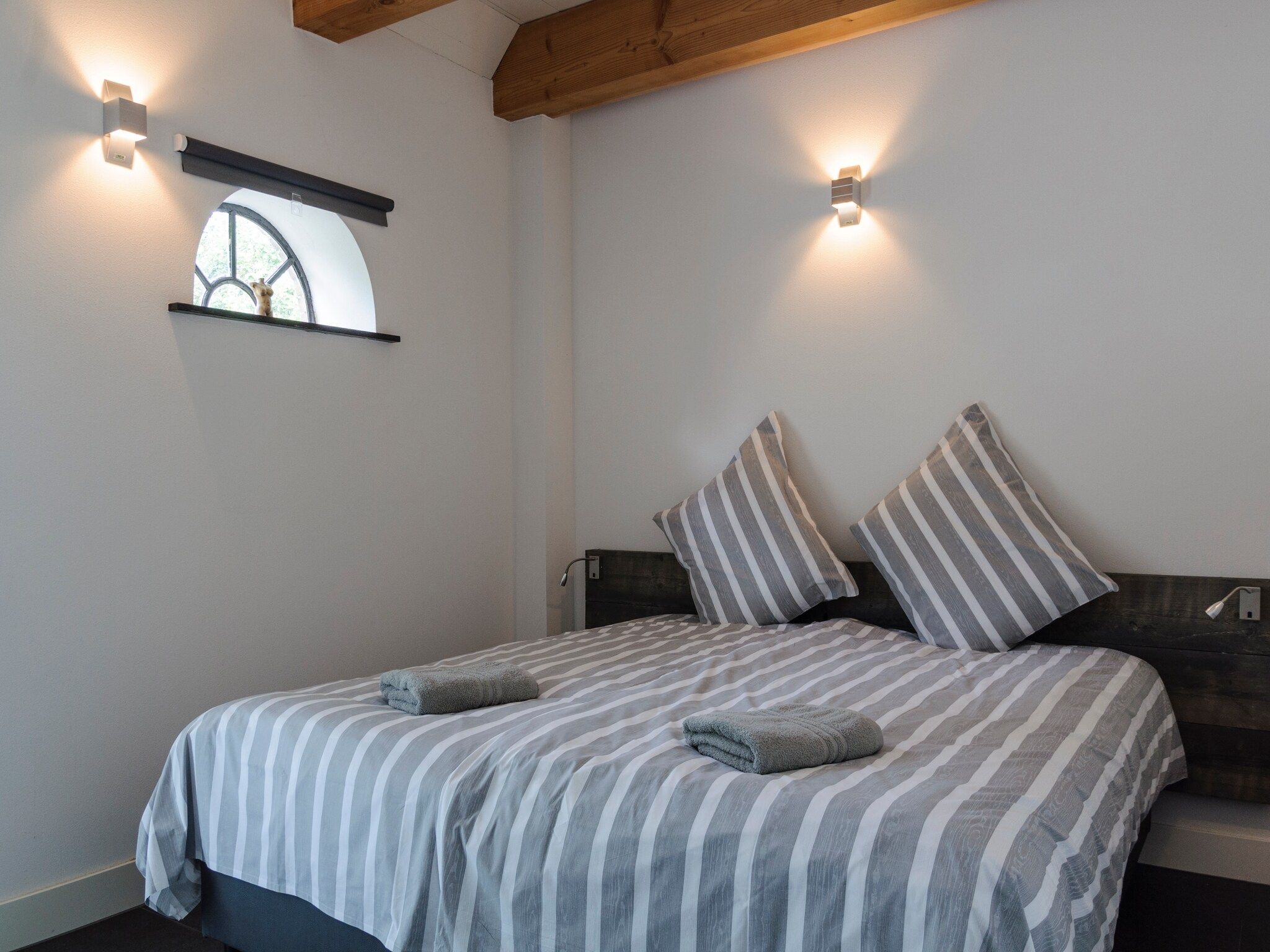 Een slaapkamer van Groepsaccomodatie - Balkenhoeve in Schagen