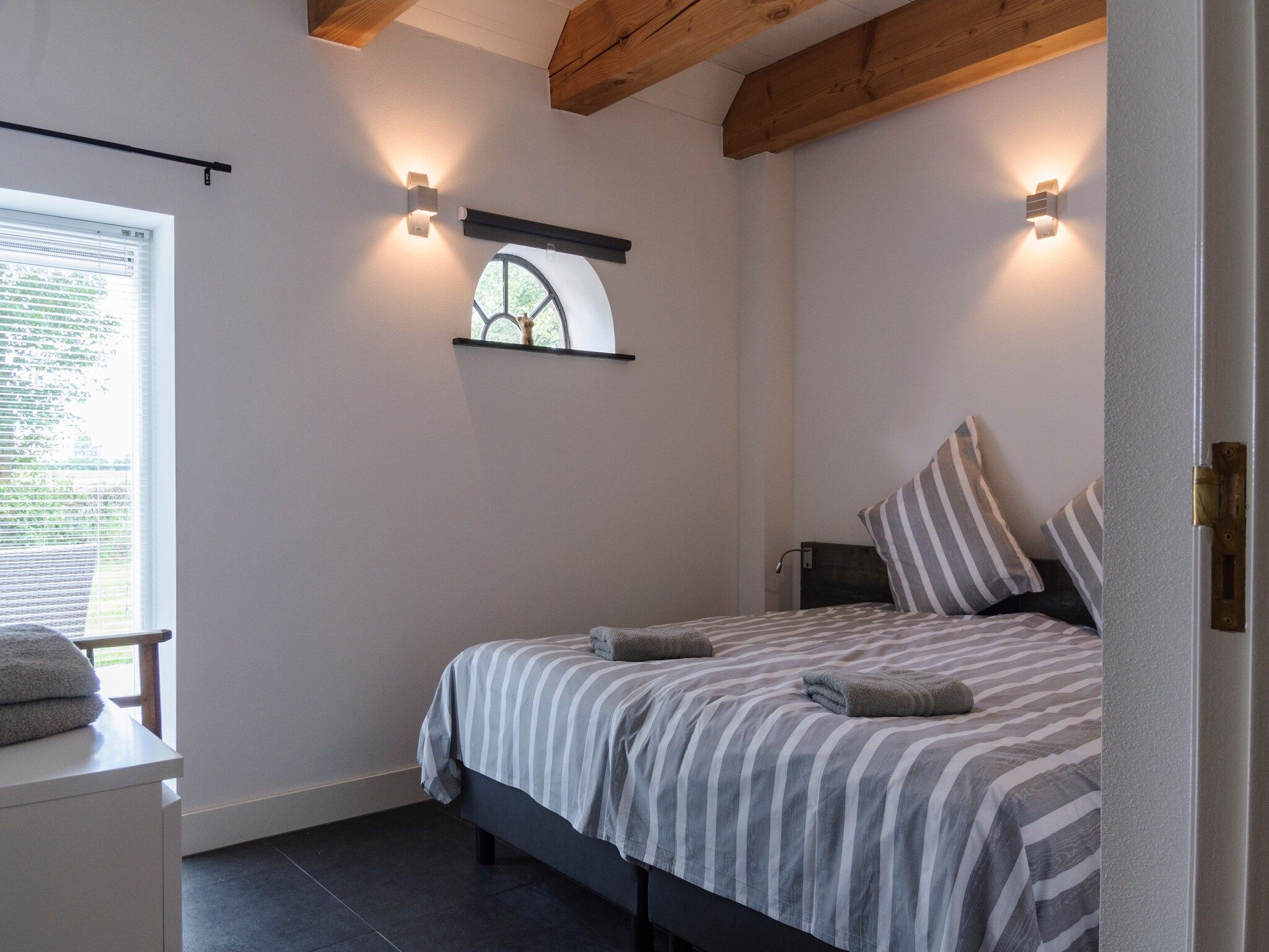 Een slaapkamer van Groepsaccomodatie - Balkenhoeve in Schagen