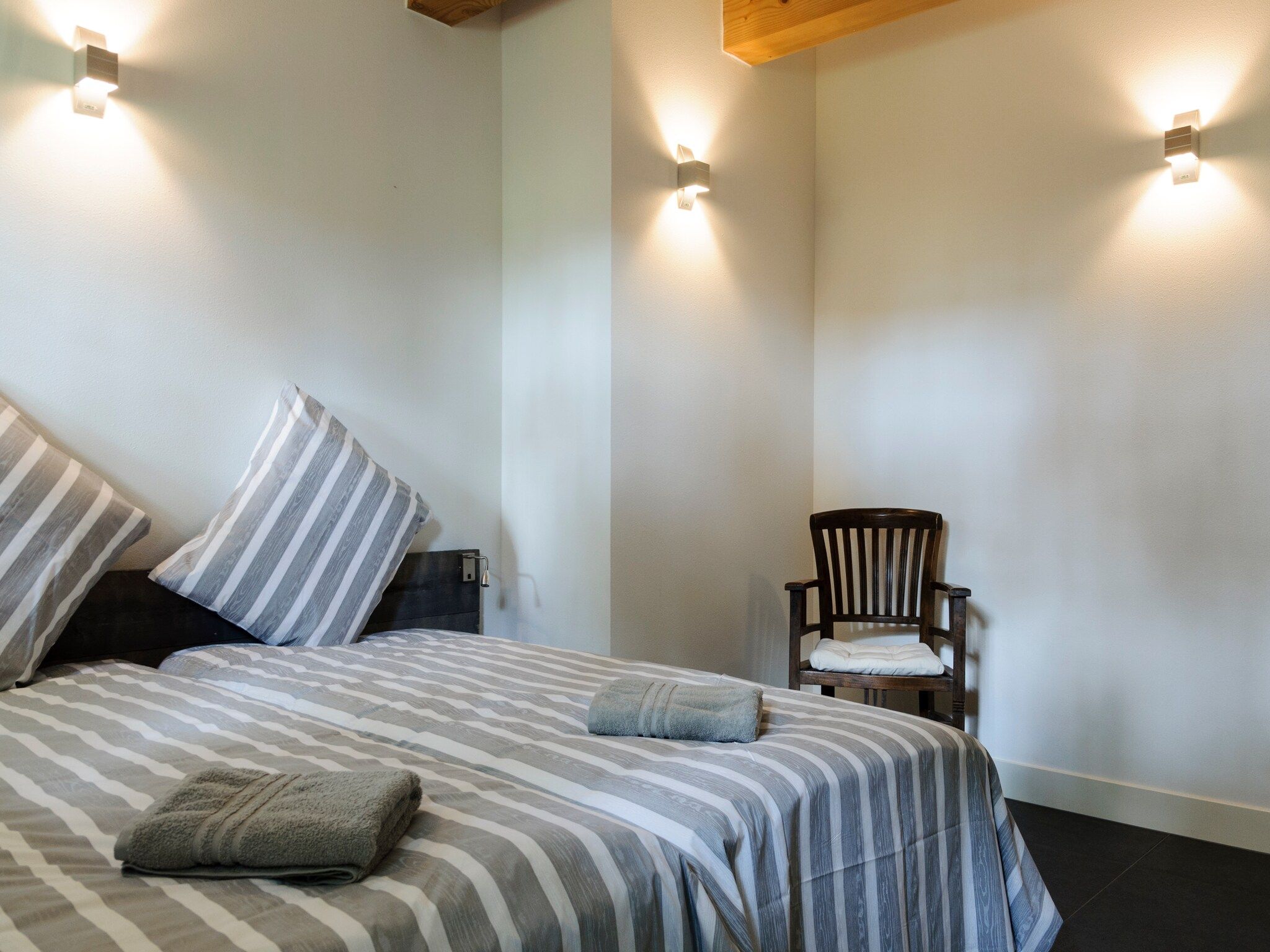 Een slaapkamer van Groepsaccomodatie - Balkenhoeve in Schagen