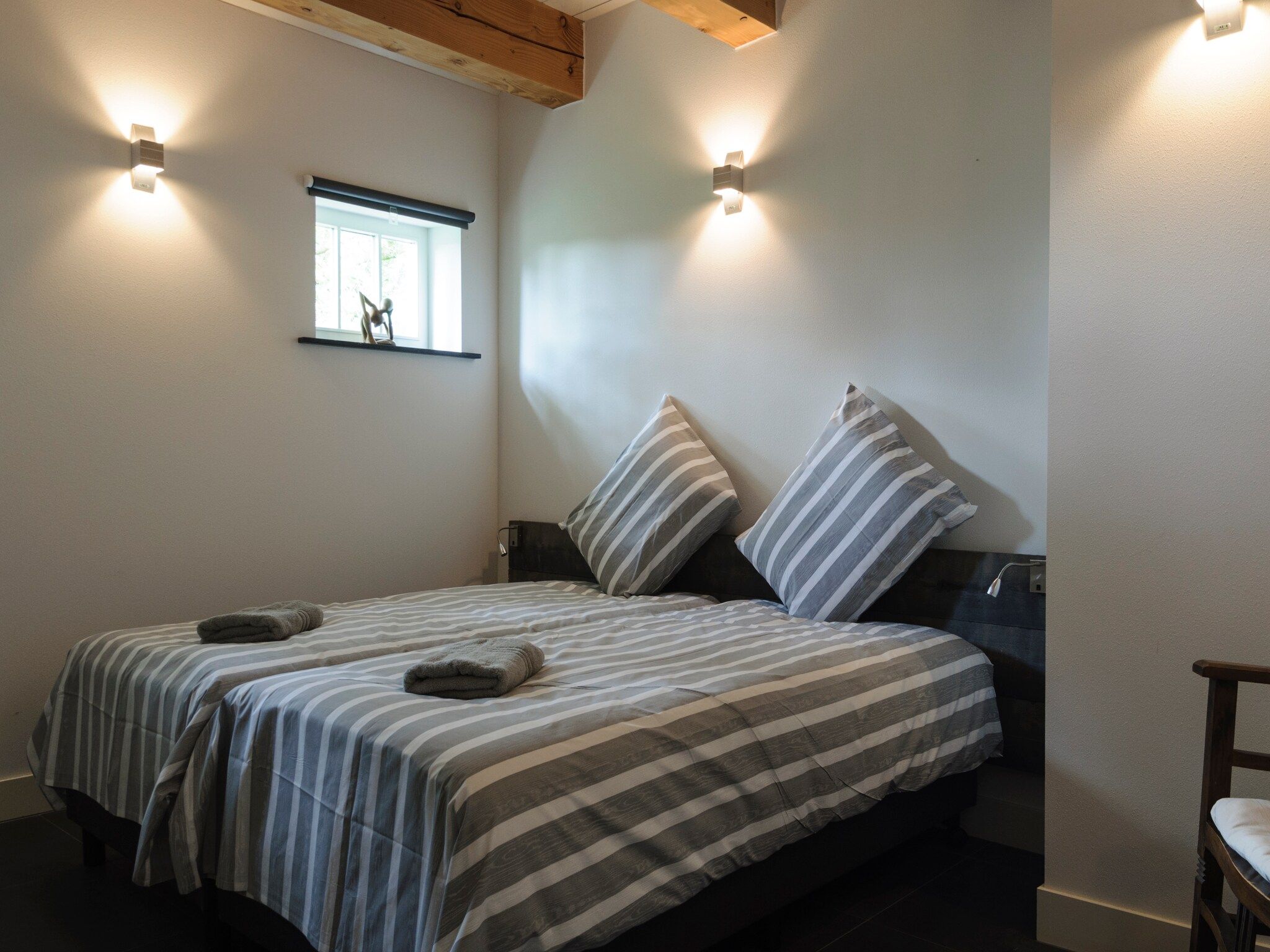 Een slaapkamer van Groepsaccomodatie - Balkenhoeve in Schagen