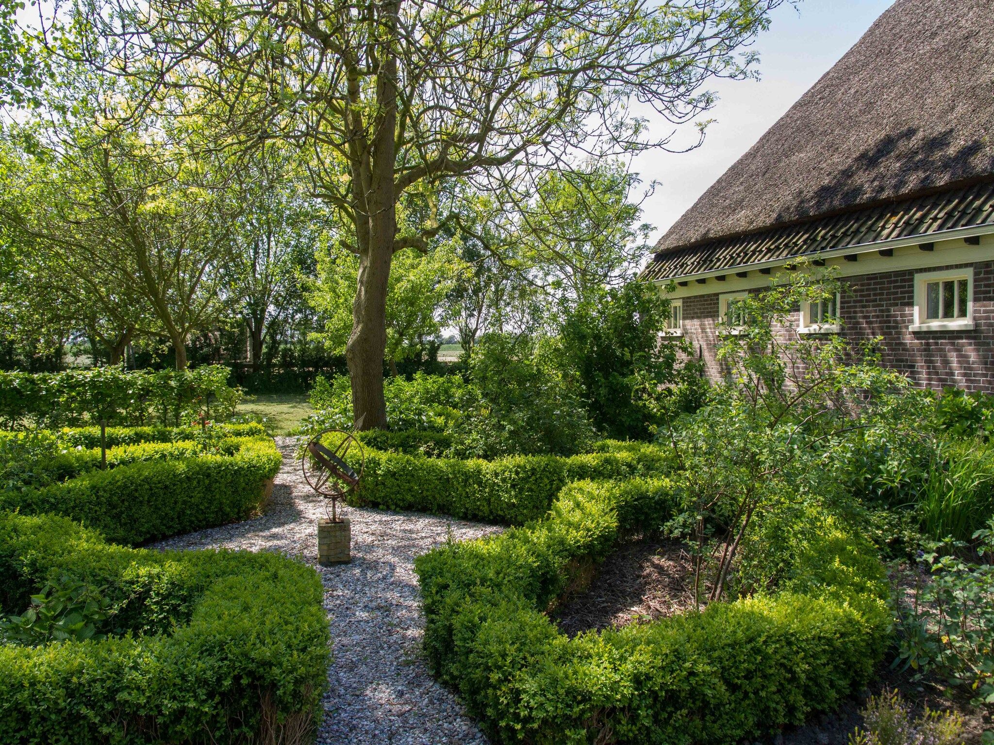 De tuin van Appartement Boerderij in Schagen