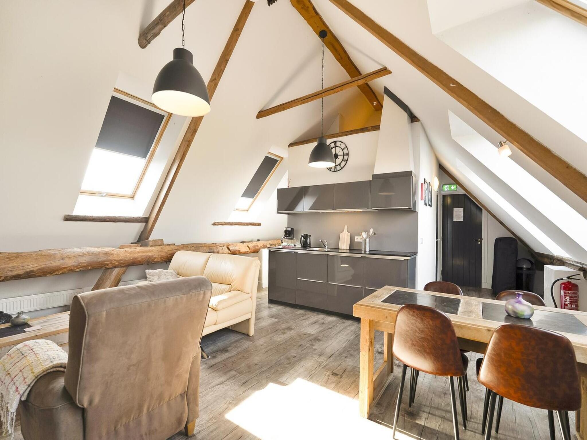 De woonkamer van Appartement Rustiek in Schagen