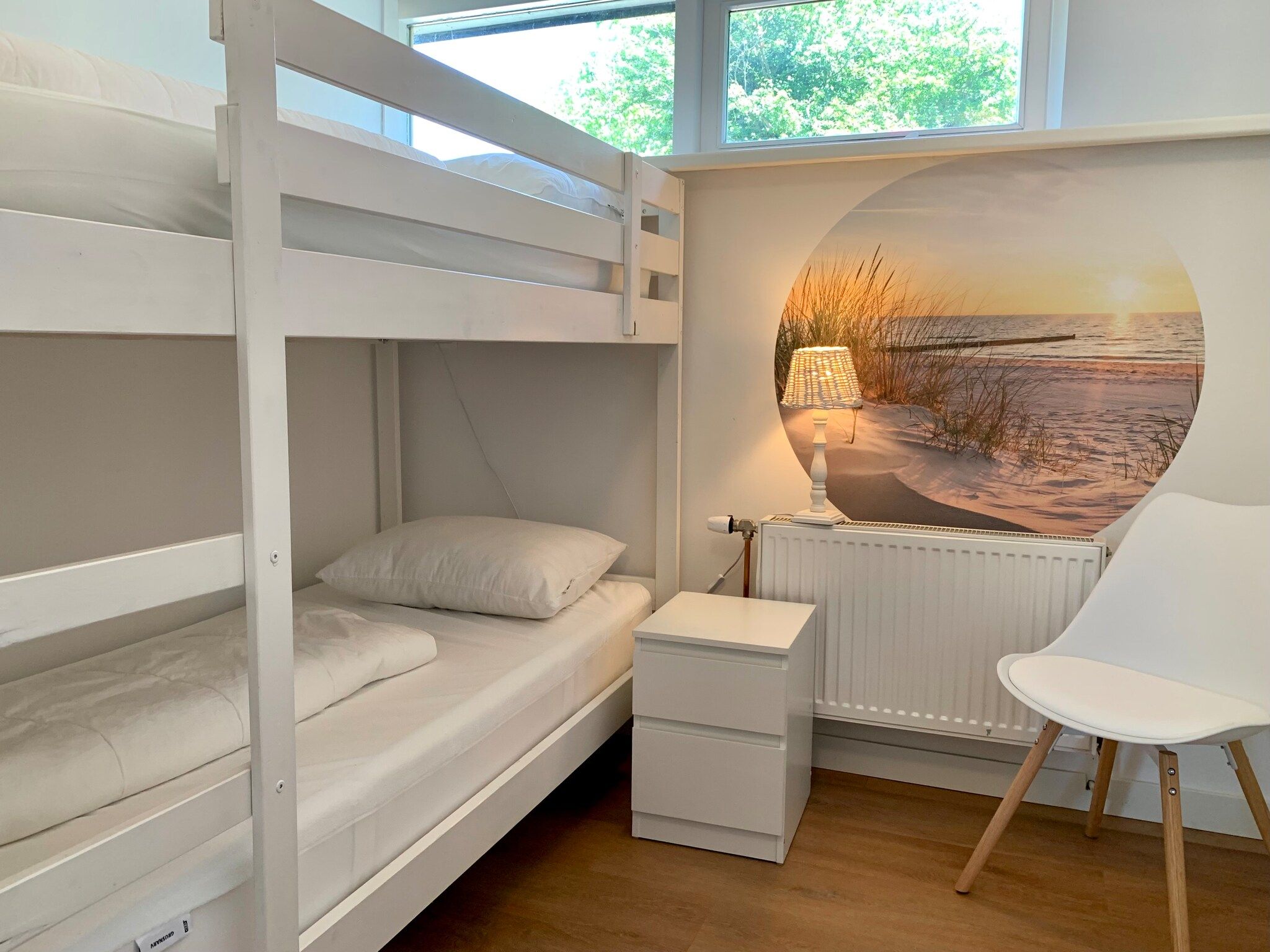 Een slaapkamer van Wildrijk 075 in Sint Maartenszee