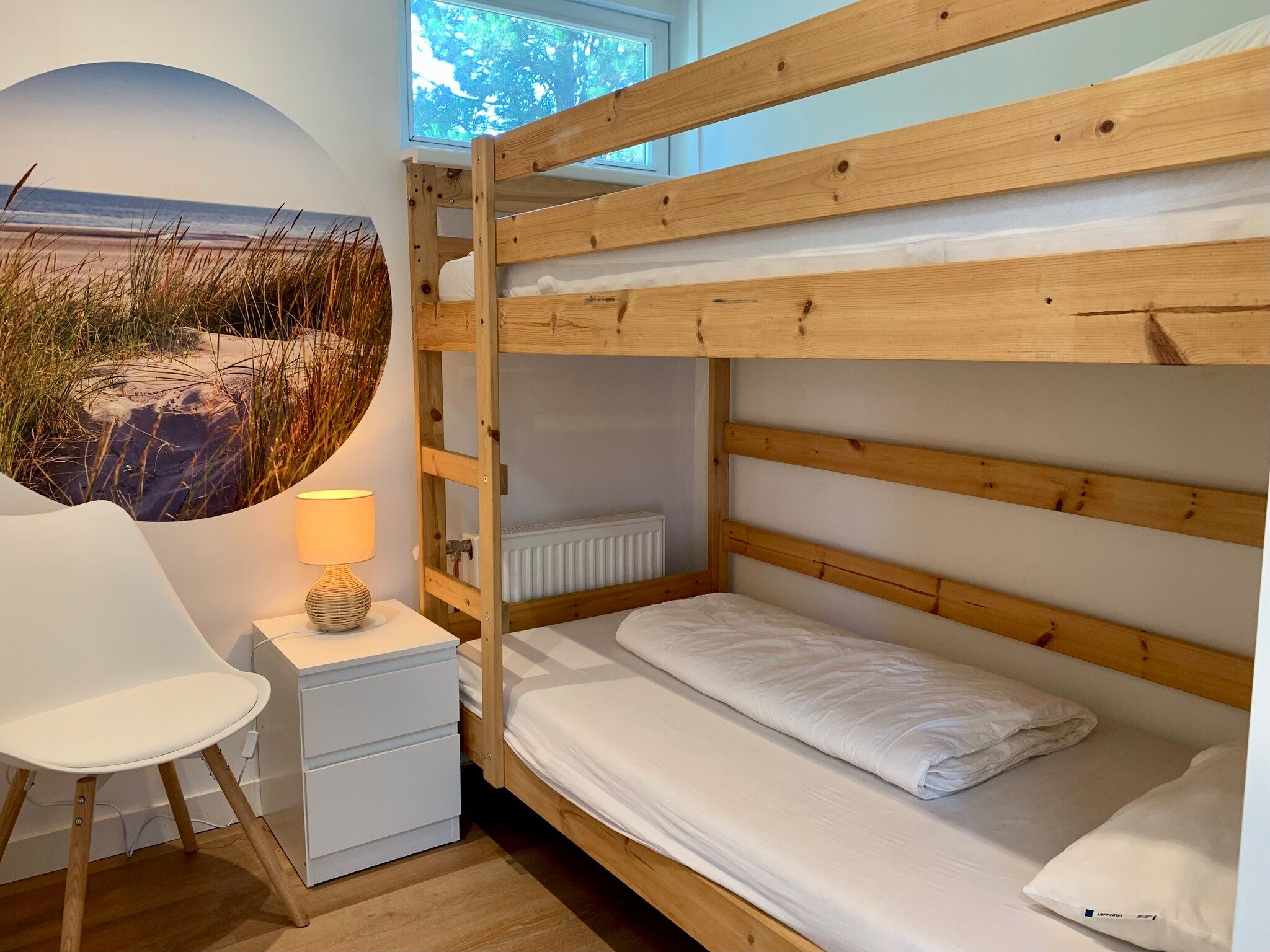 Een slaapkamer van Wildrijk 075 in Sint Maartenszee