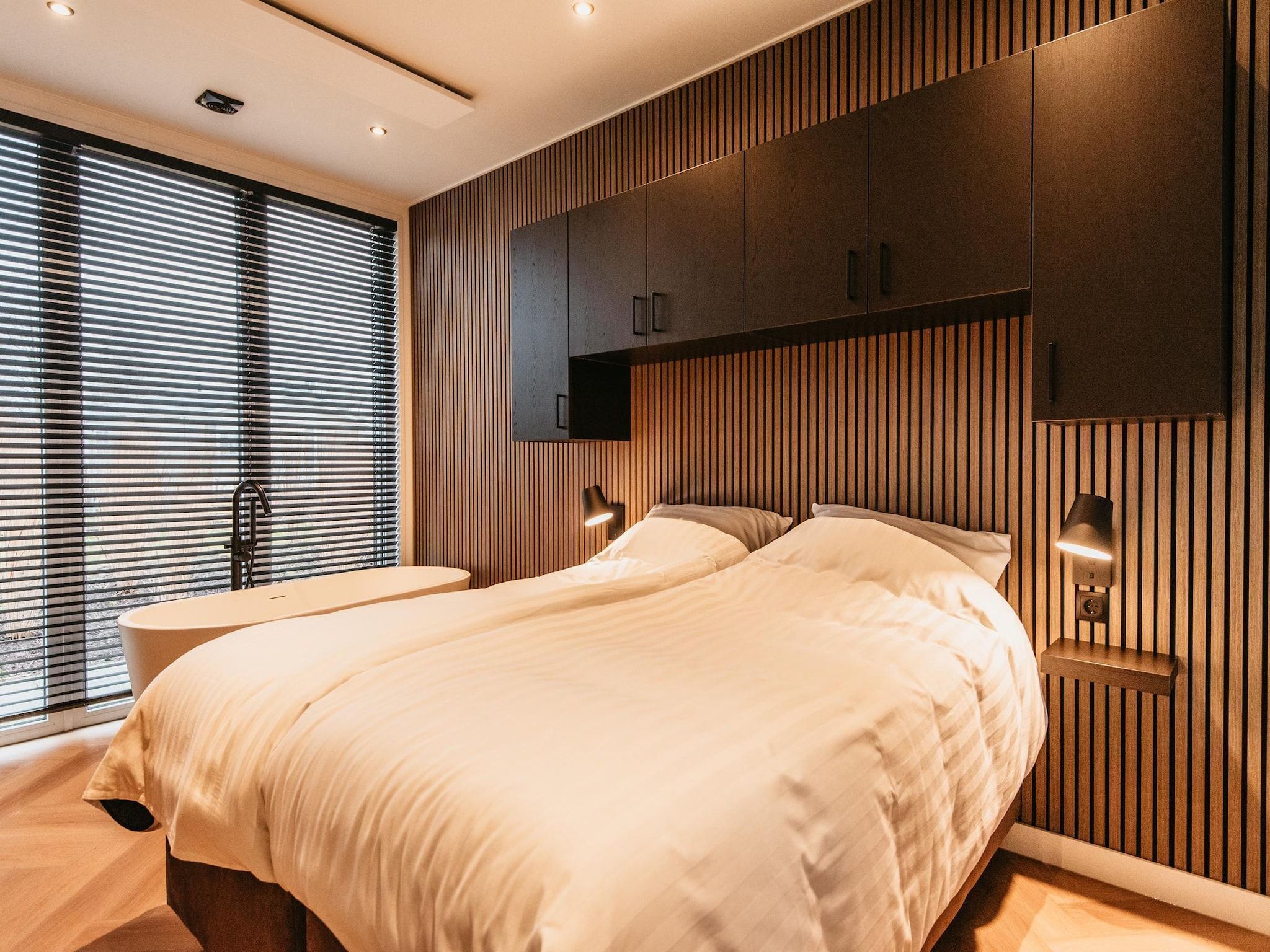 Een slaapkamer van Chalet aan het Water - Betuwse Hofjes - 4 pax December in Kesteren