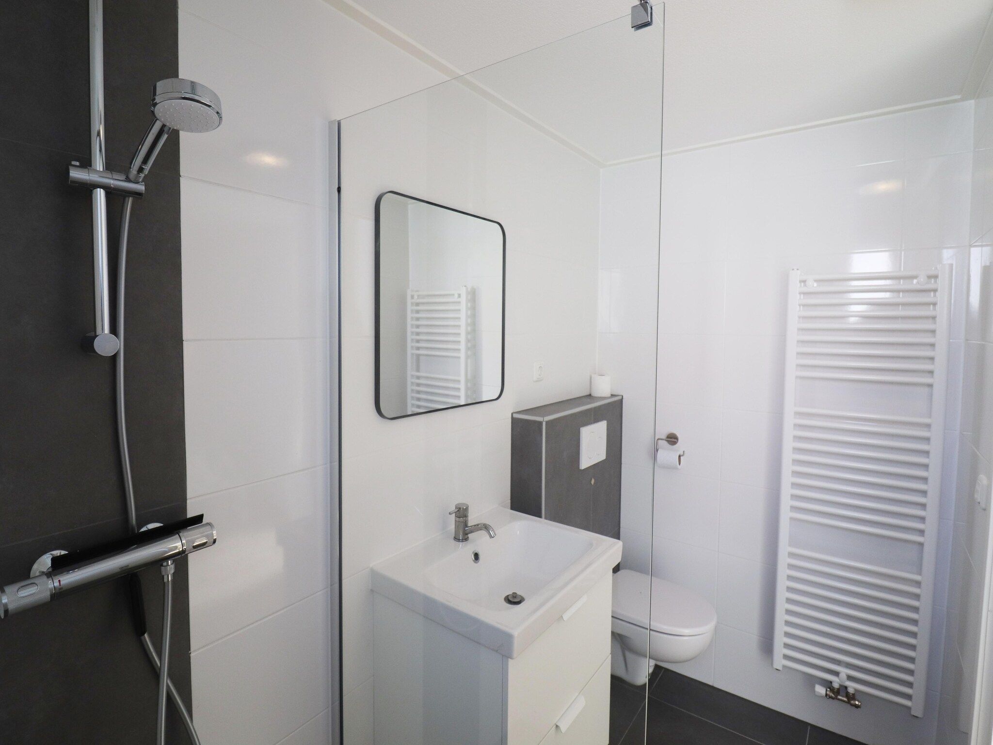 De badkamer van Chaletwoning in Sint Nicolaasga