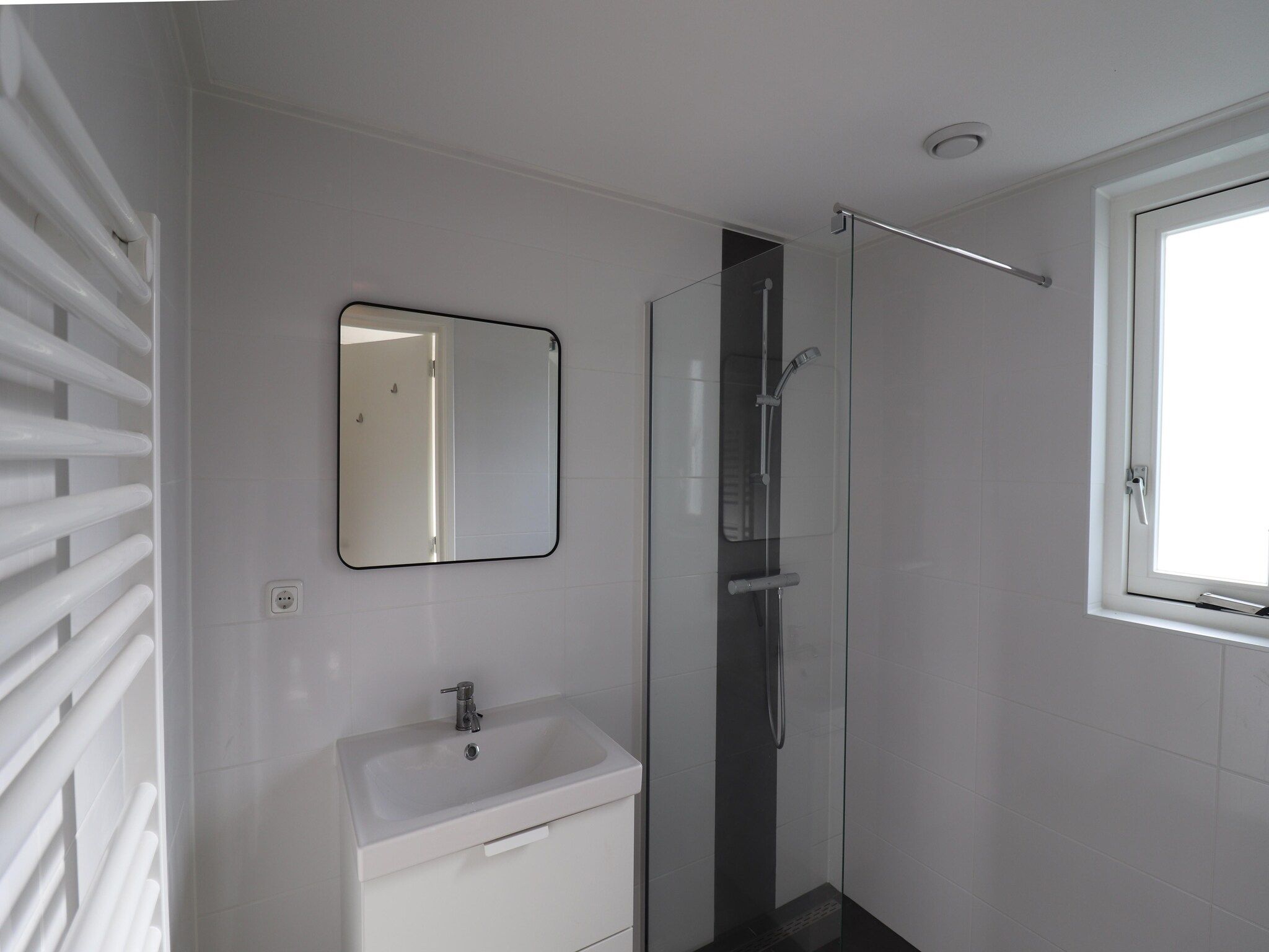 De badkamer van Chaletwoning in Sint Nicolaasga