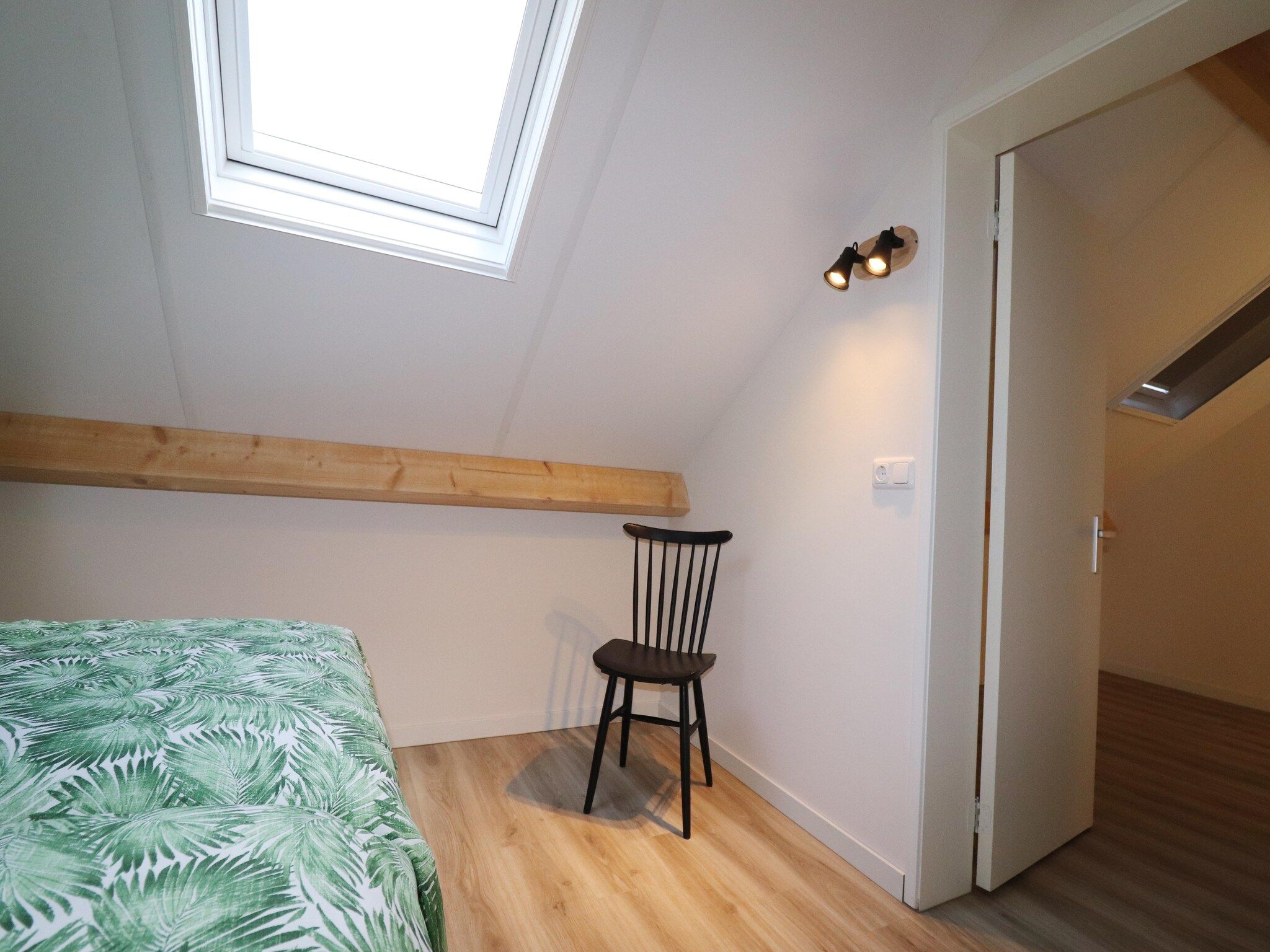 Een slaapkamer van Chaletwoning in Sint Nicolaasga