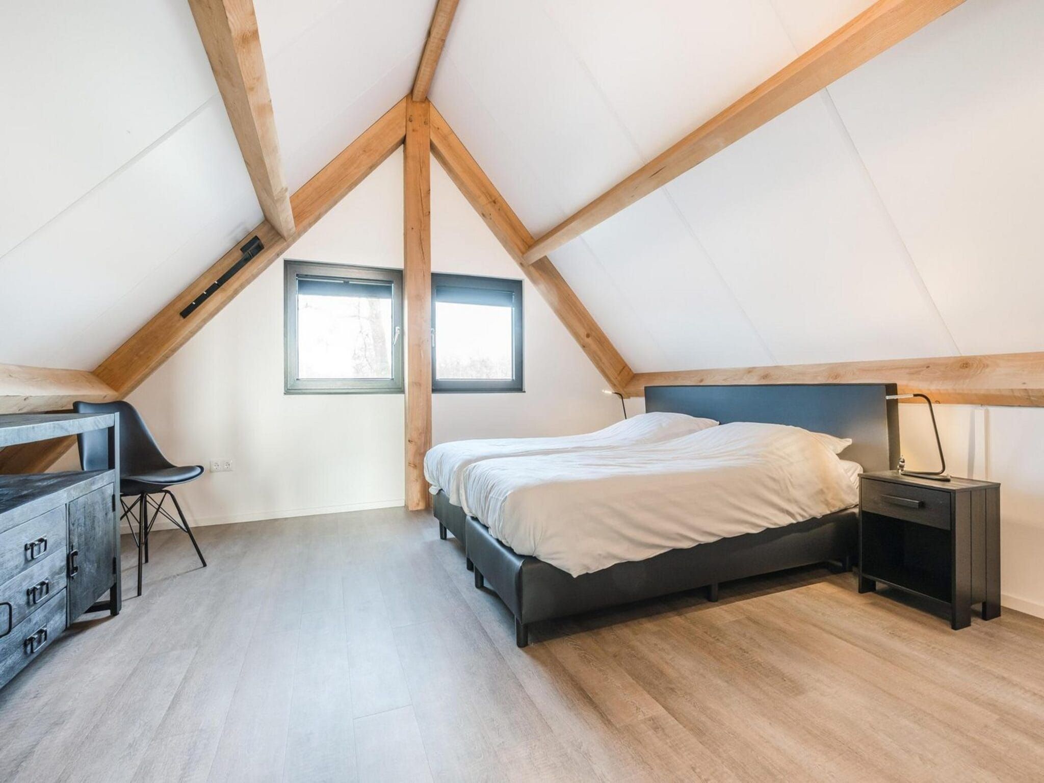 Een slaapkamer van Farm Lodge 677 in Baarle-nassau