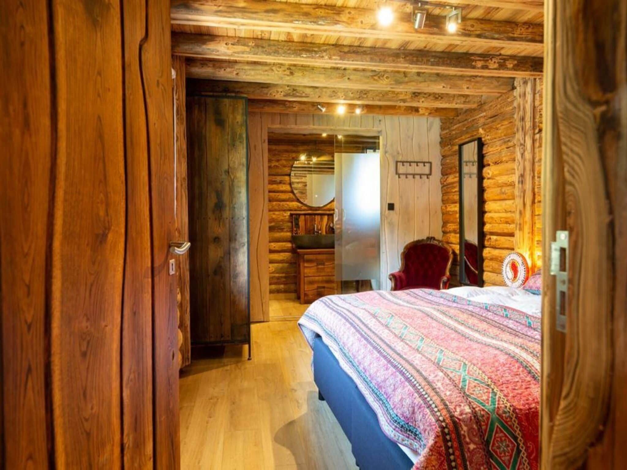 Een slaapkamer van Paalchalet 723 in Baarle-nassau