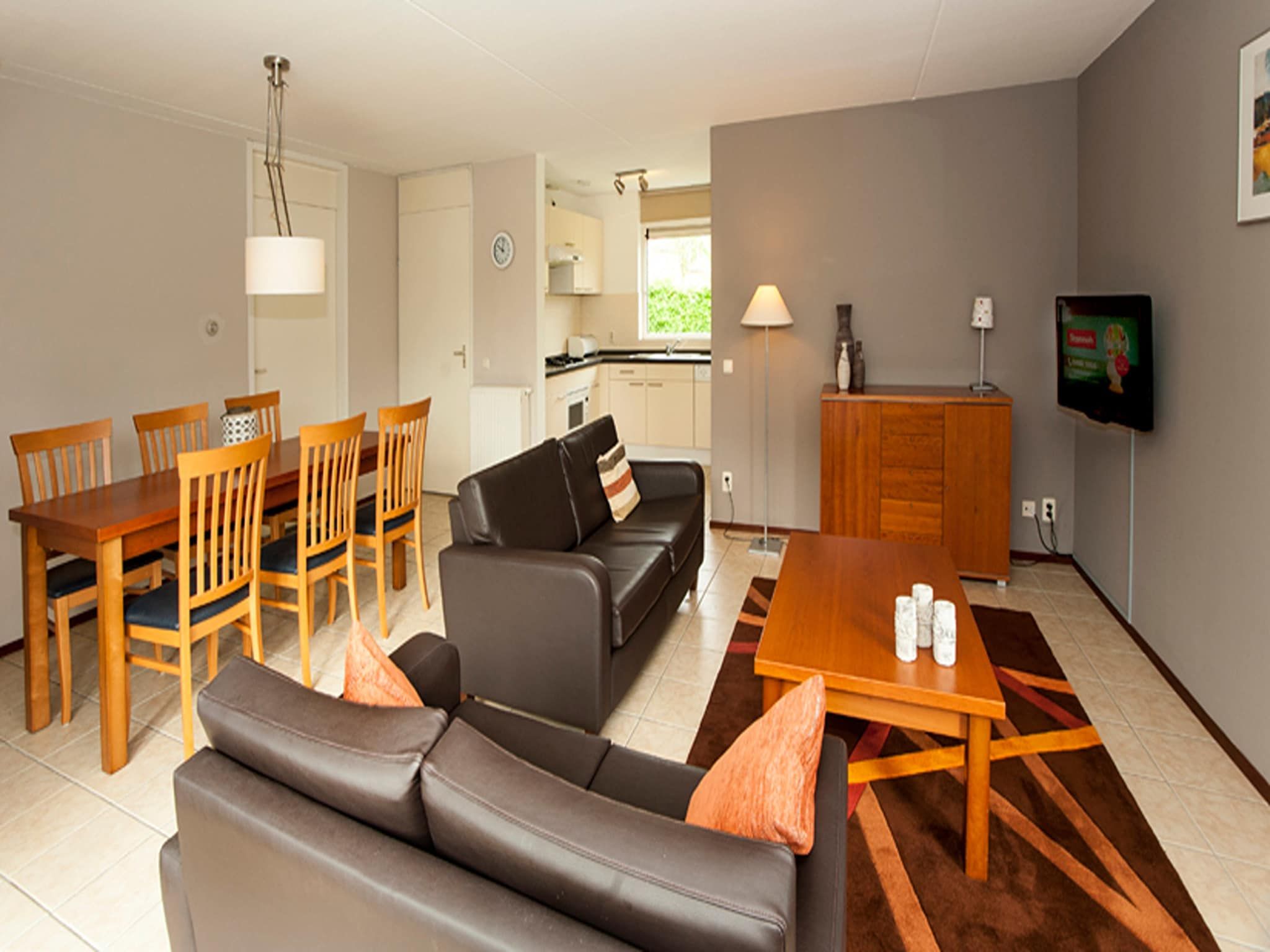 De woonkamer van Boswoning in Heel