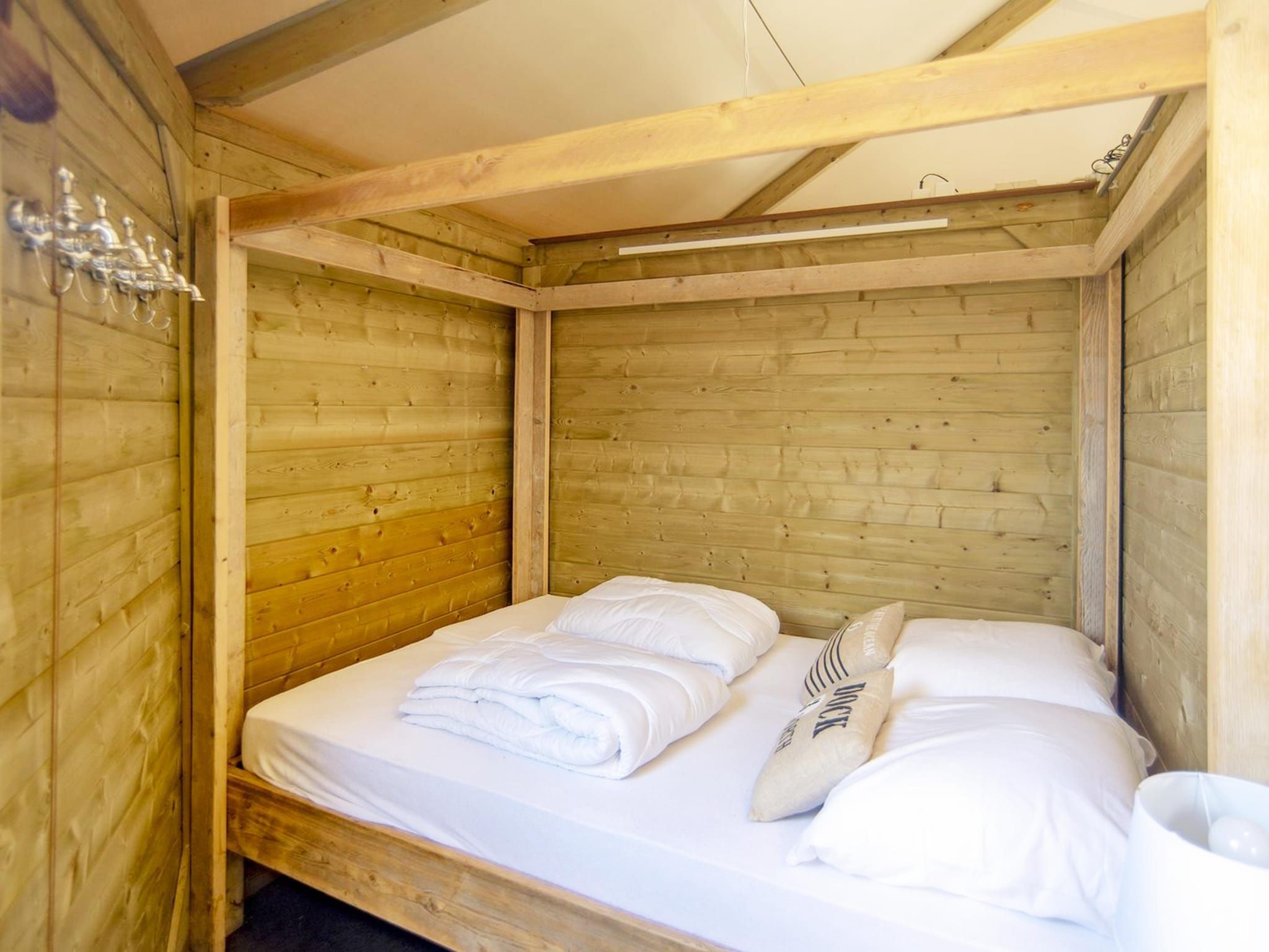 Een slaapkamer van Dune home 4 people, with private sanitary facilities in Almere