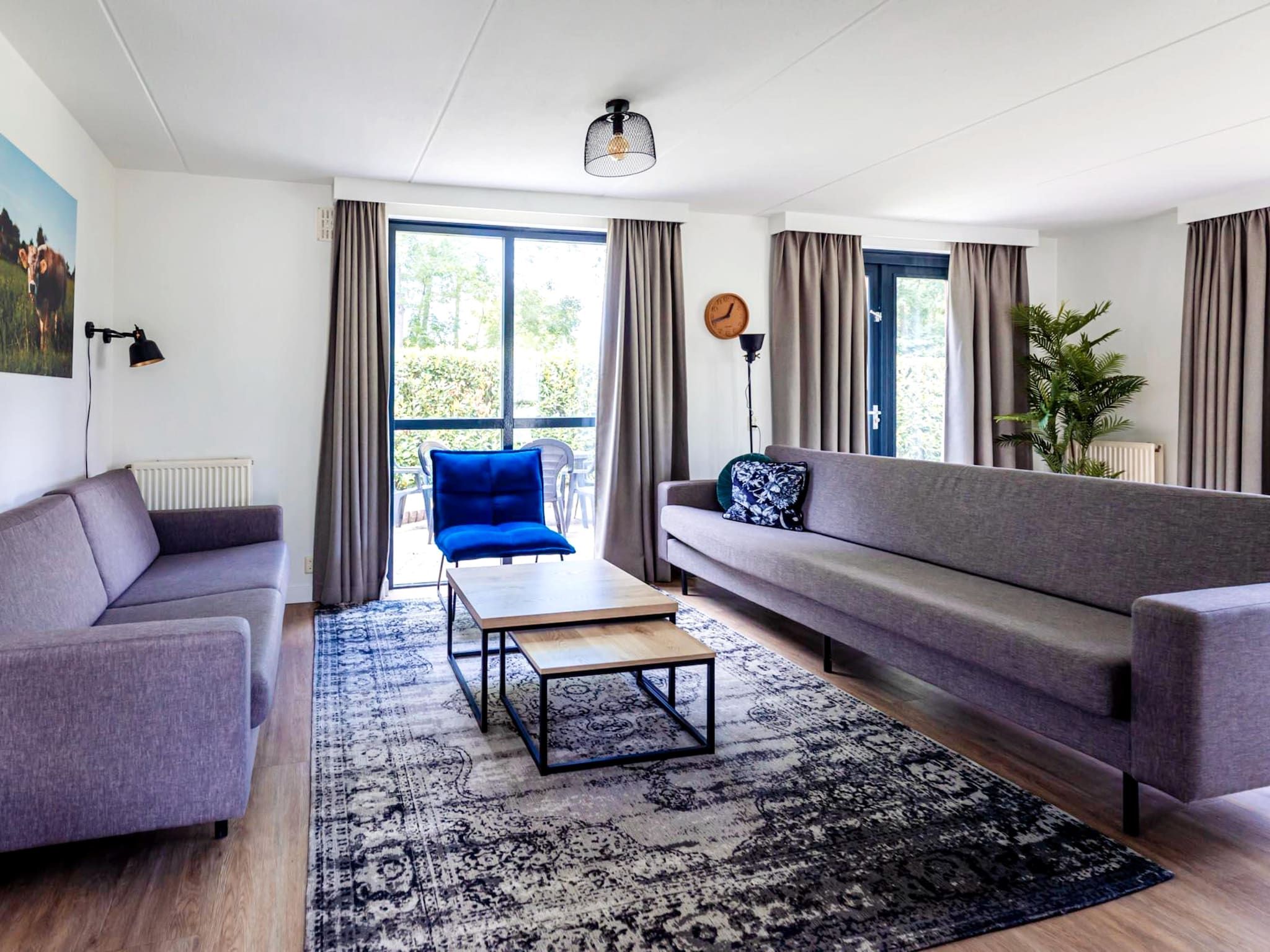 De woonkamer van 8 - Persons Family bungalow in Ewijk