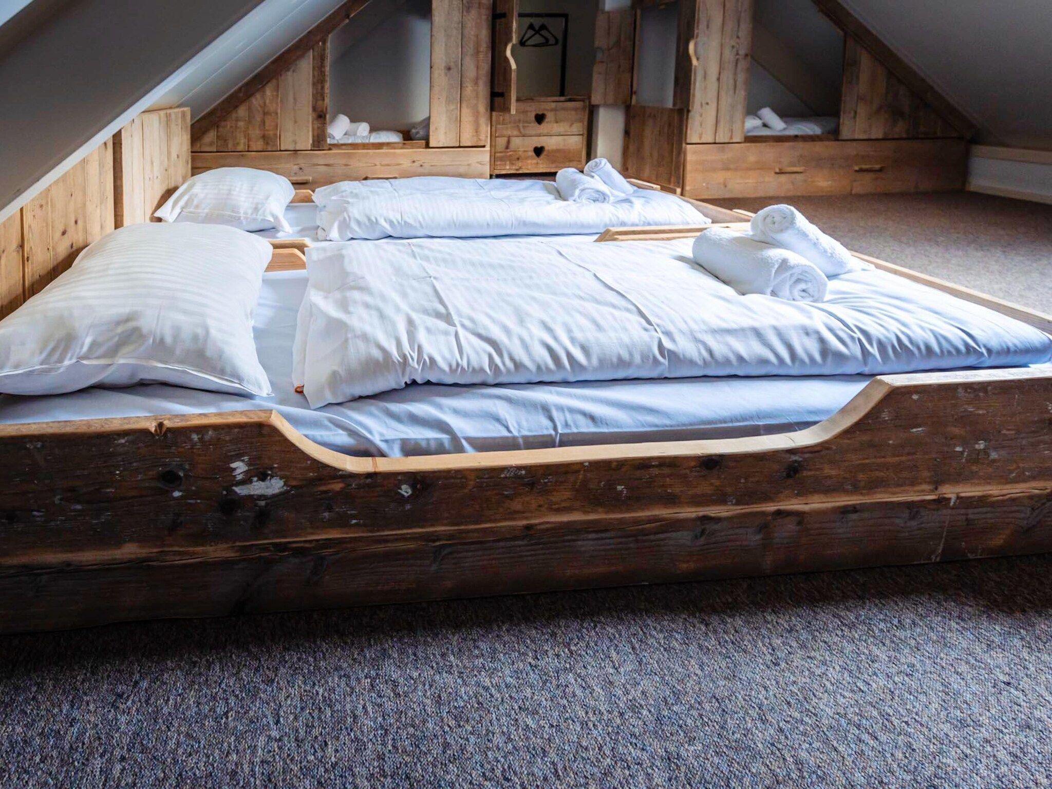 Een slaapkamer van 16 - Persons Family bungalow in Ewijk