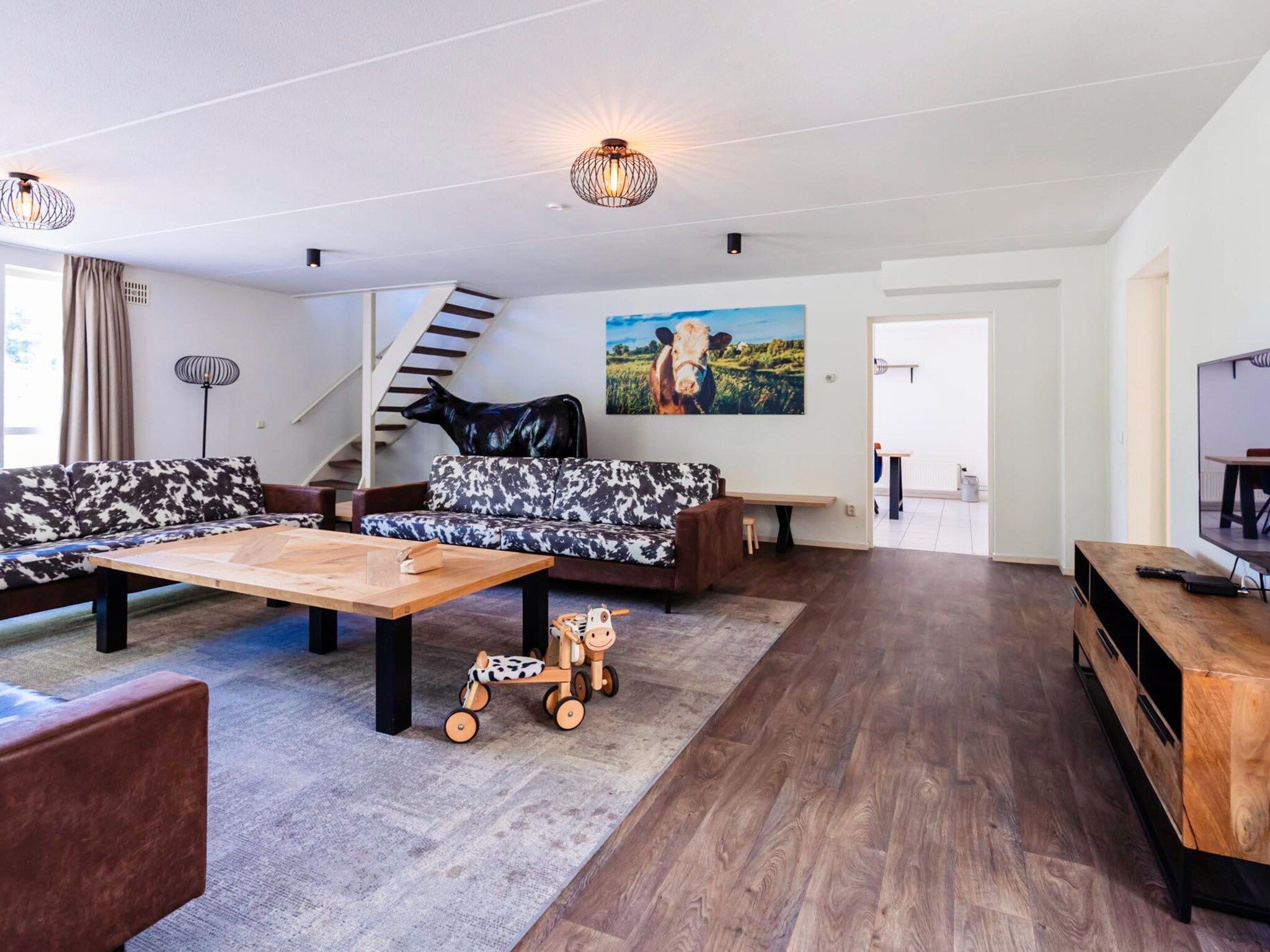 De woonkamer van 16 - Persons Family bungalow in Ewijk