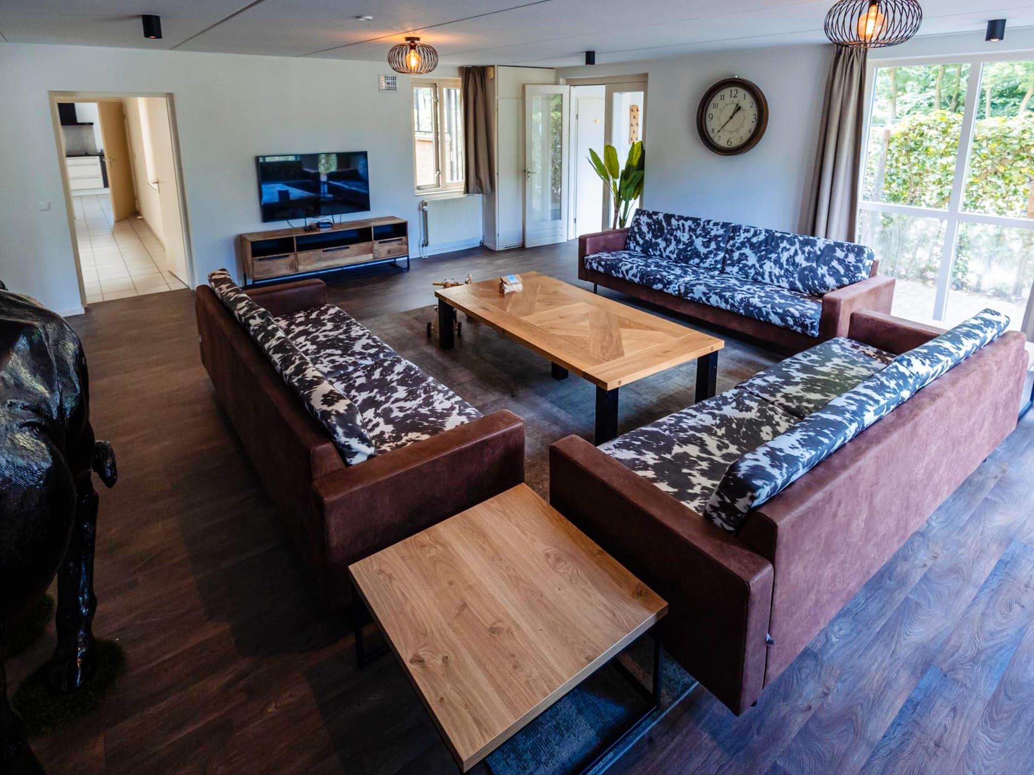 De woonkamer van 16 - Persons Family bungalow in Ewijk