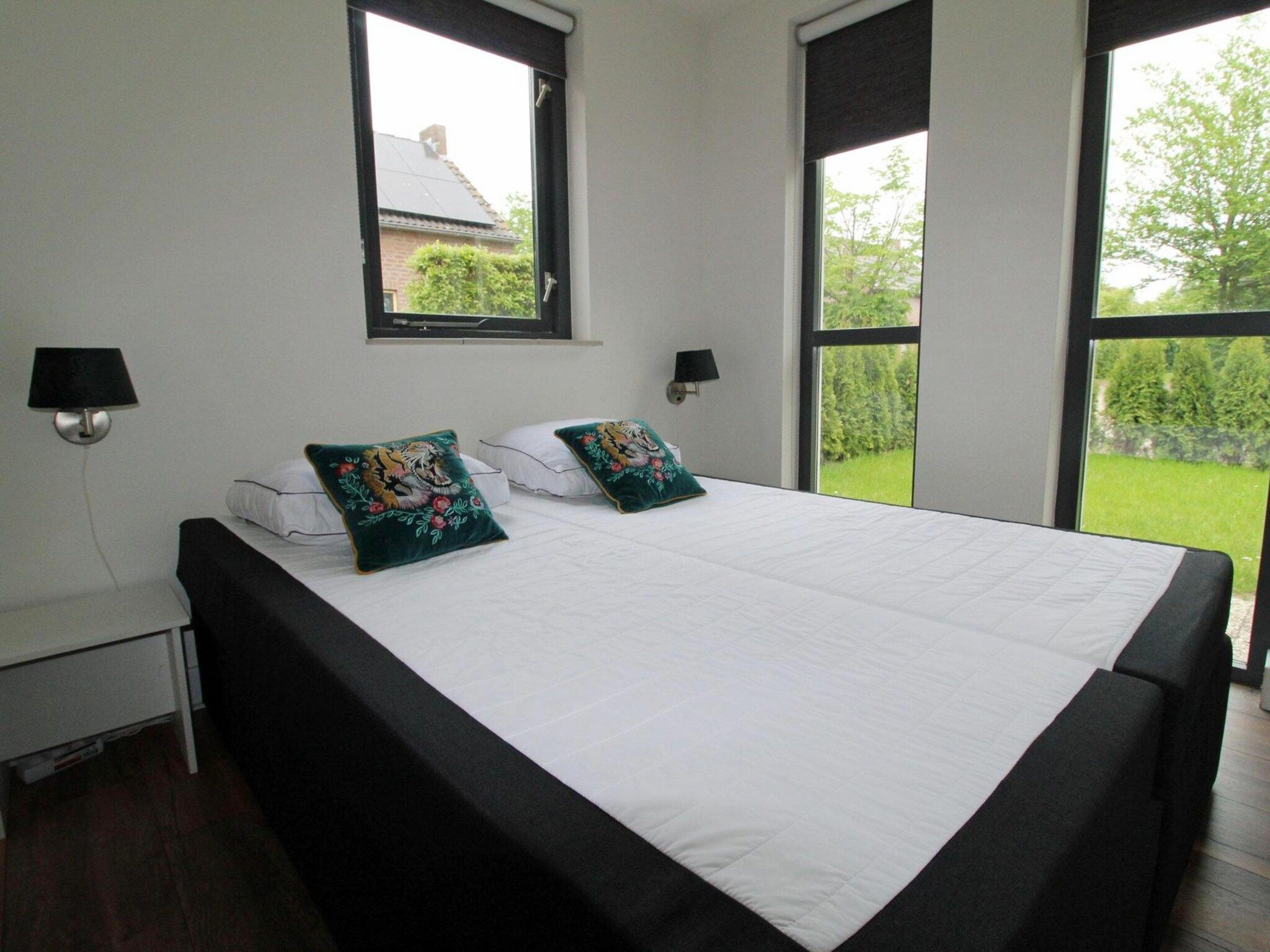 Een slaapkamer van 6 - Persons Bungalow La Moufflon in Ewijk