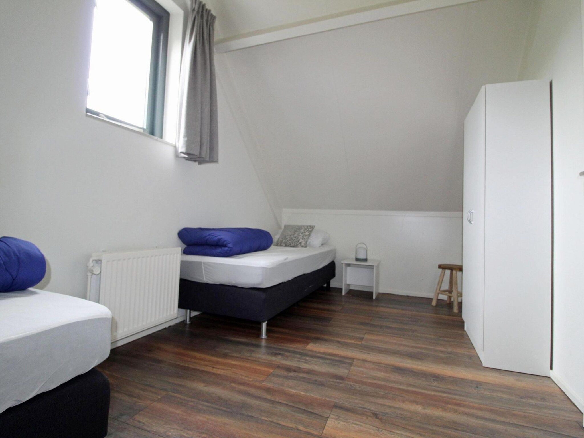 Een slaapkamer van 6 - Persons Bungalow La Moufflon in Ewijk