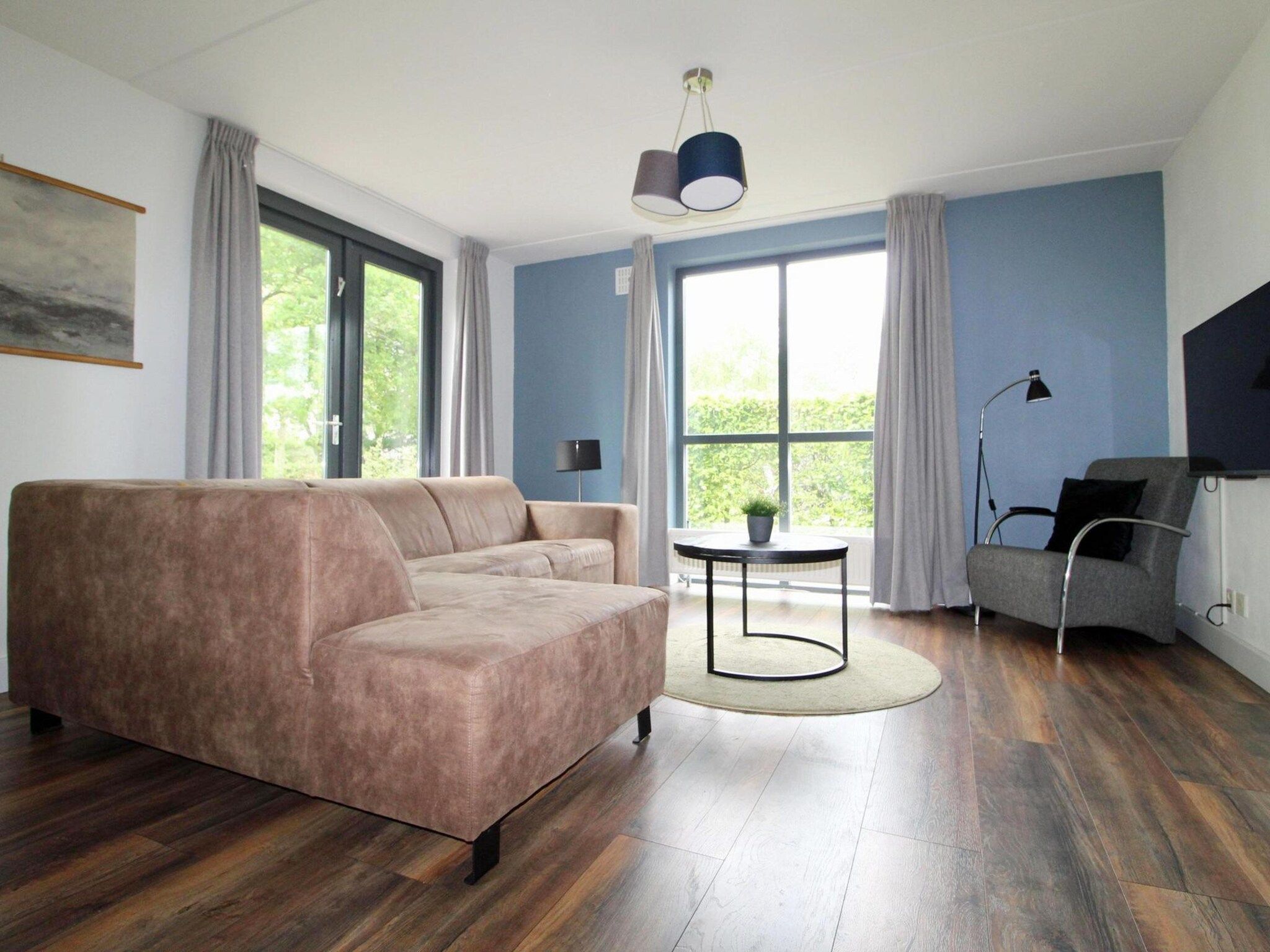 De woonkamer van 6 - Persons Bungalow La Moufflon in Ewijk