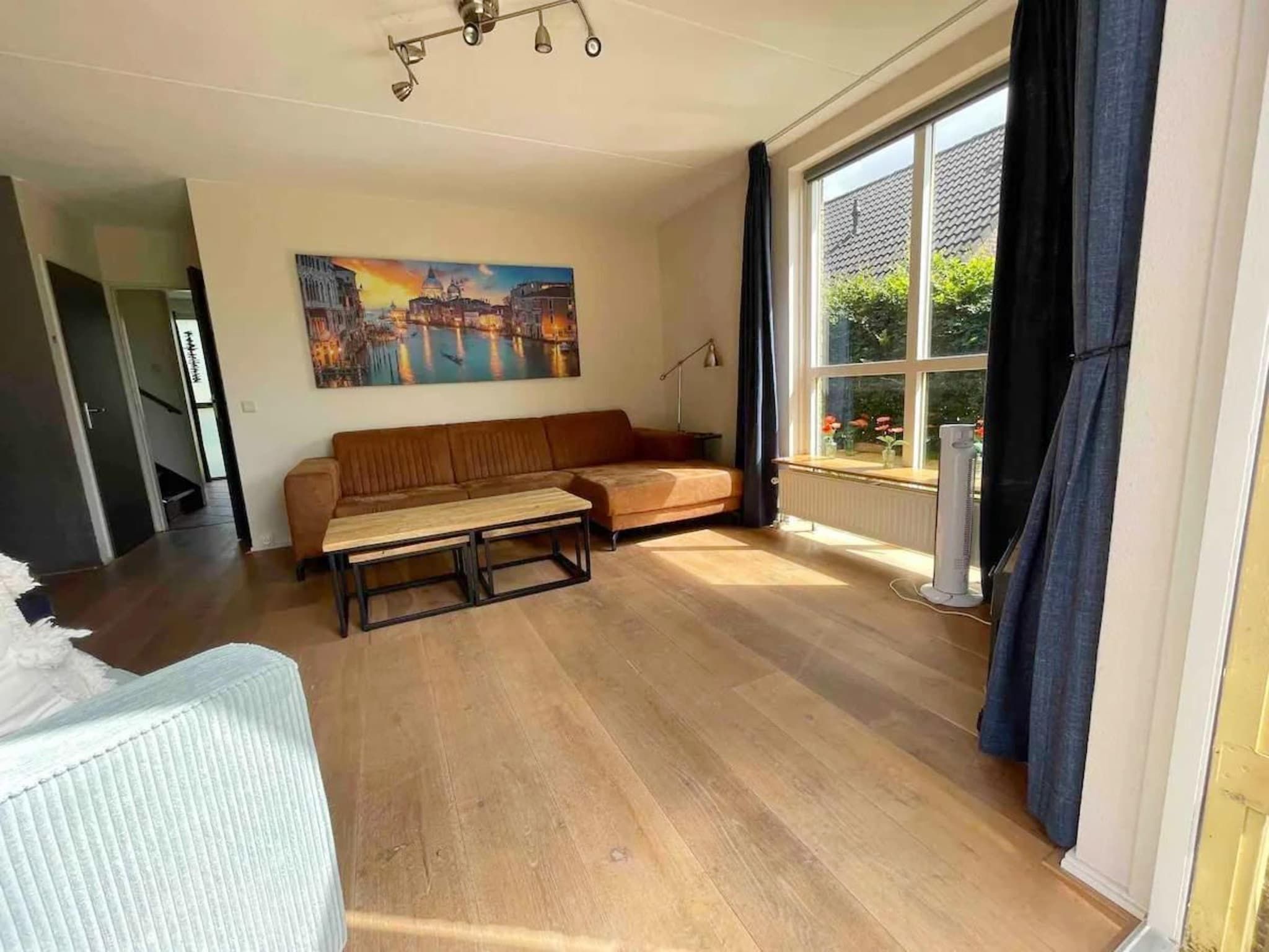 De woonkamer van 6 - Person Forest Pet & Family Bungalow in Ewijk