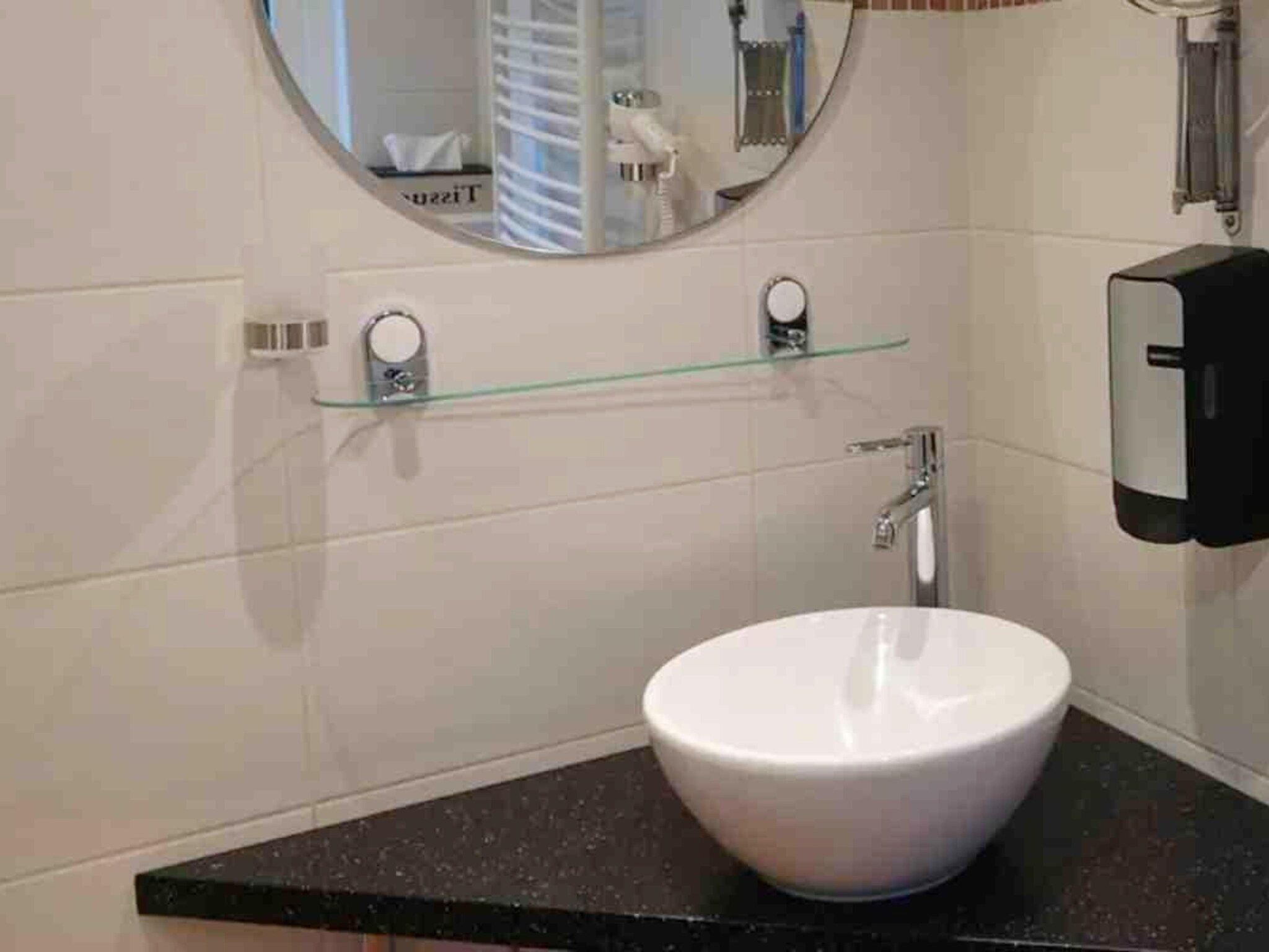 De badkamer van 6 - Person Forest Pet & Family Bungalow in Ewijk