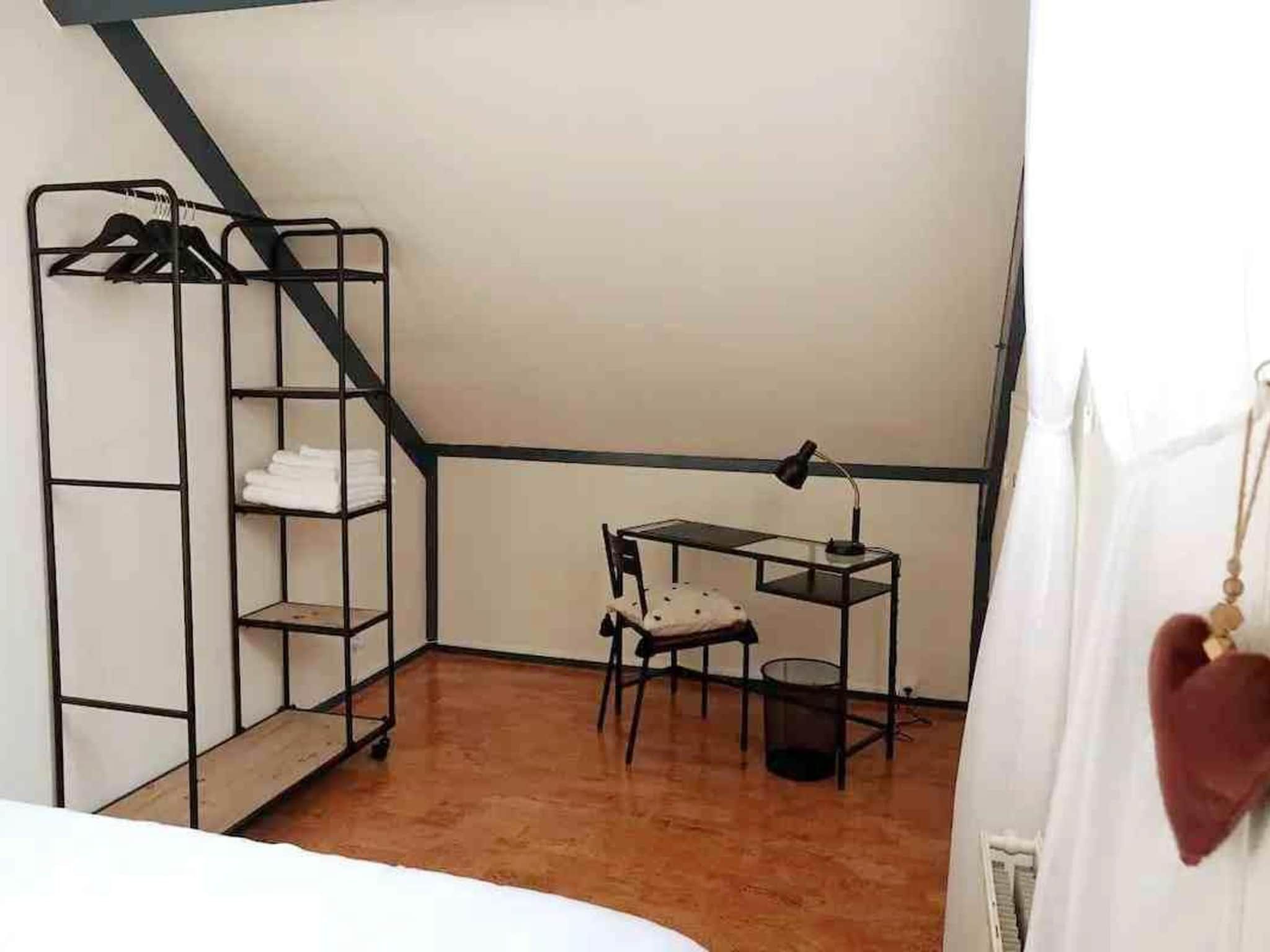 Een slaapkamer van 6 - Person Forest Pet & Family Bungalow in Ewijk