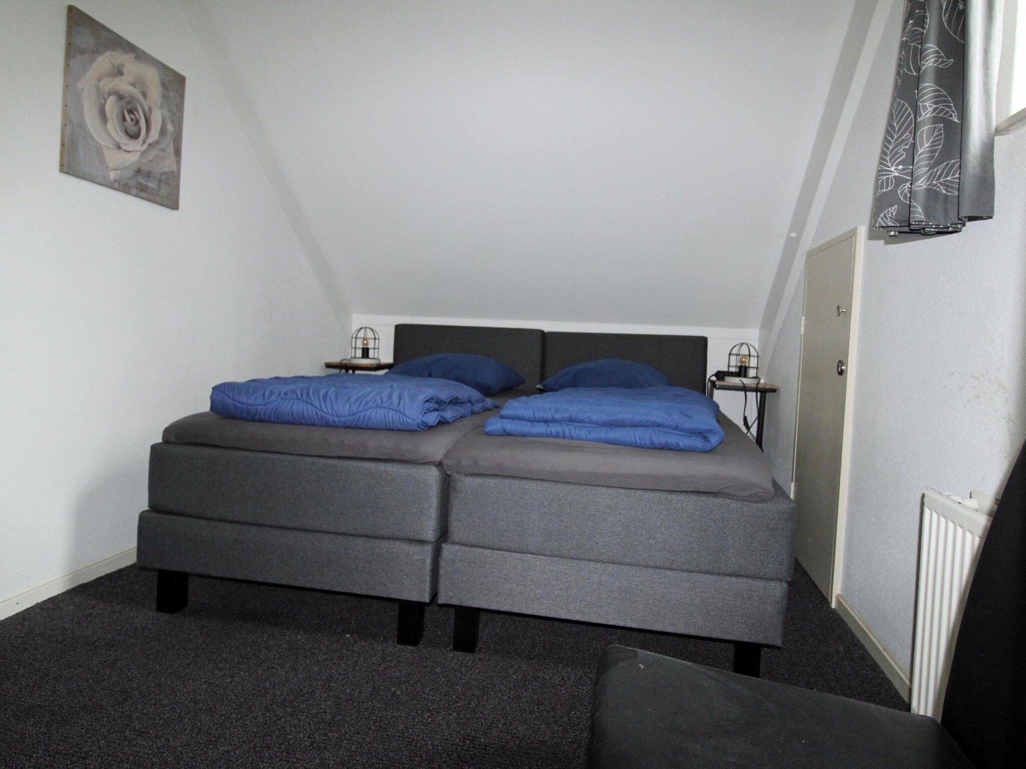 Een slaapkamer van 6 - Person Forest 28 Bungalow in Ewijk