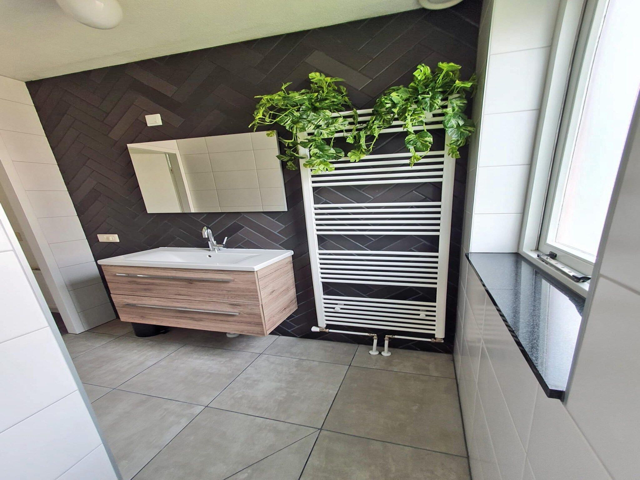 De badkamer van 5 - Person Forest 10 Bungalow in Ewijk