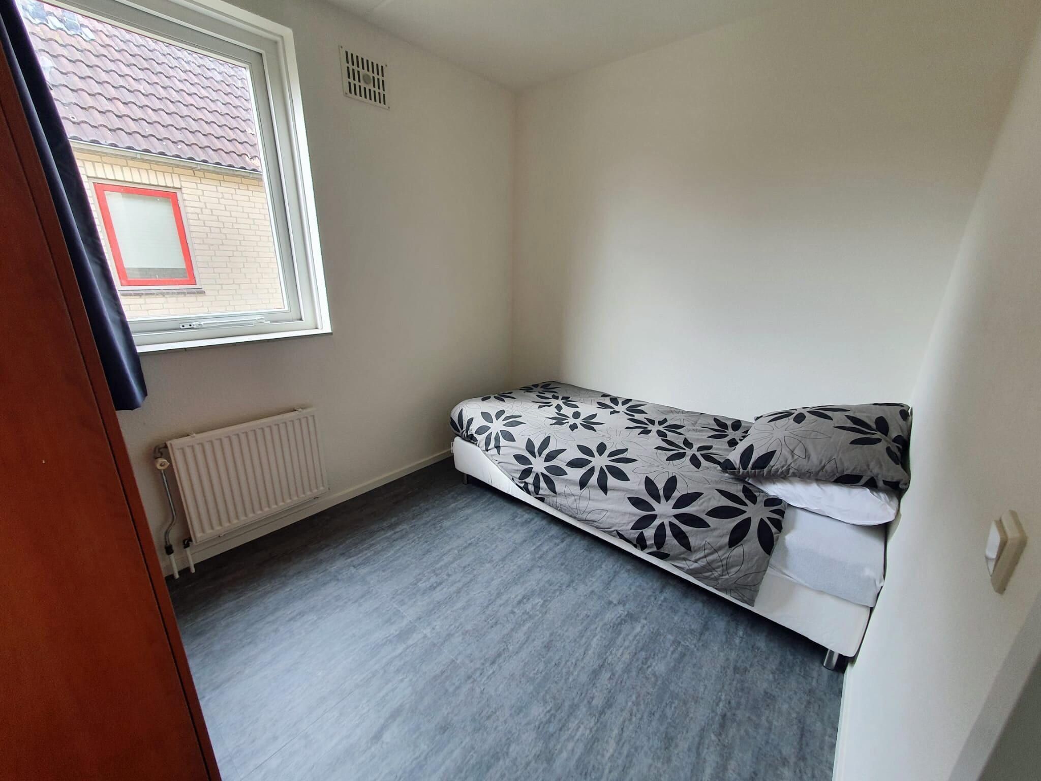 Een slaapkamer van 5 - Person Forest 10 Bungalow in Ewijk