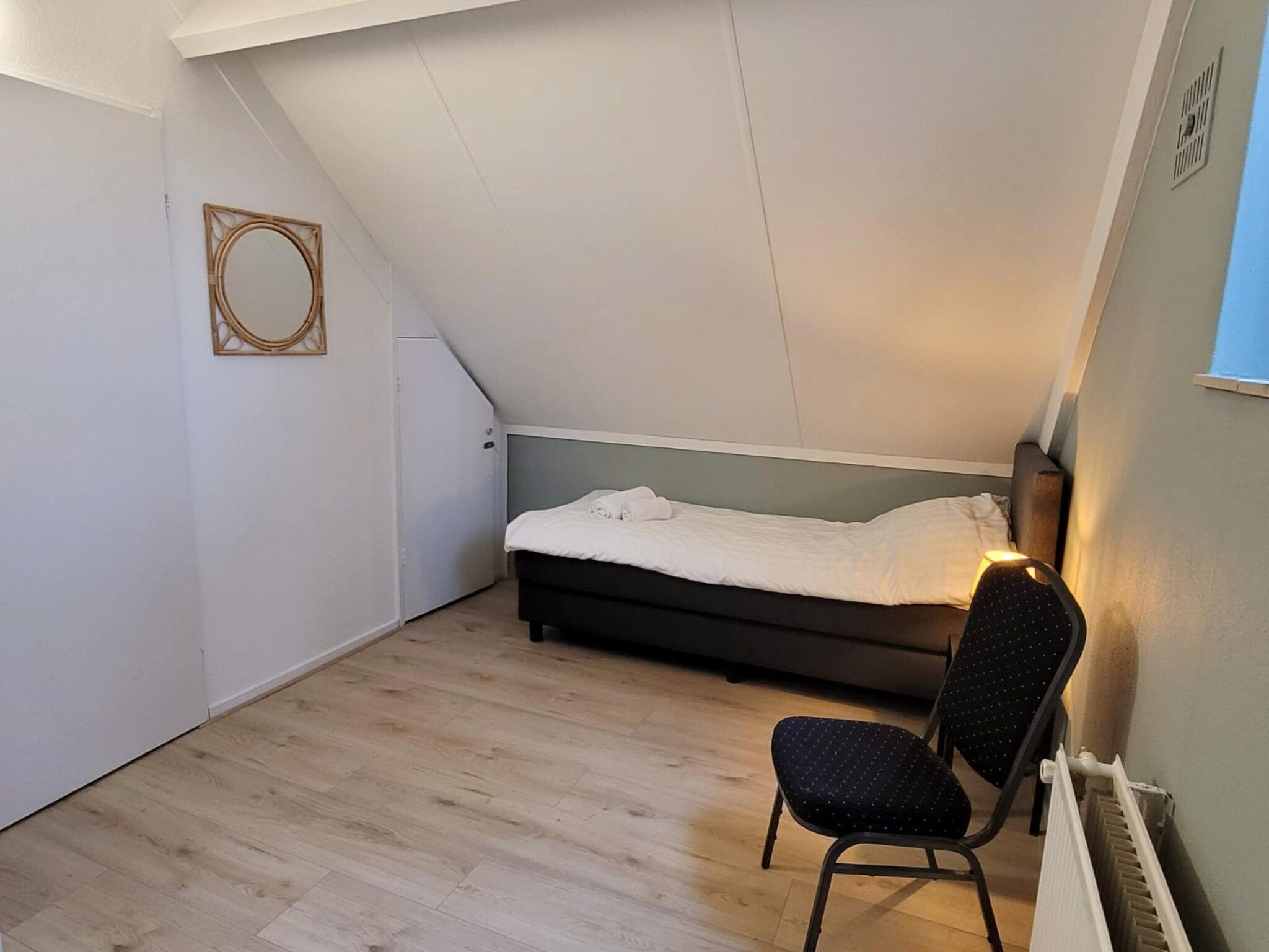 Een slaapkamer van 6 - Persons Forest Bungalow (copy) in Ewijk