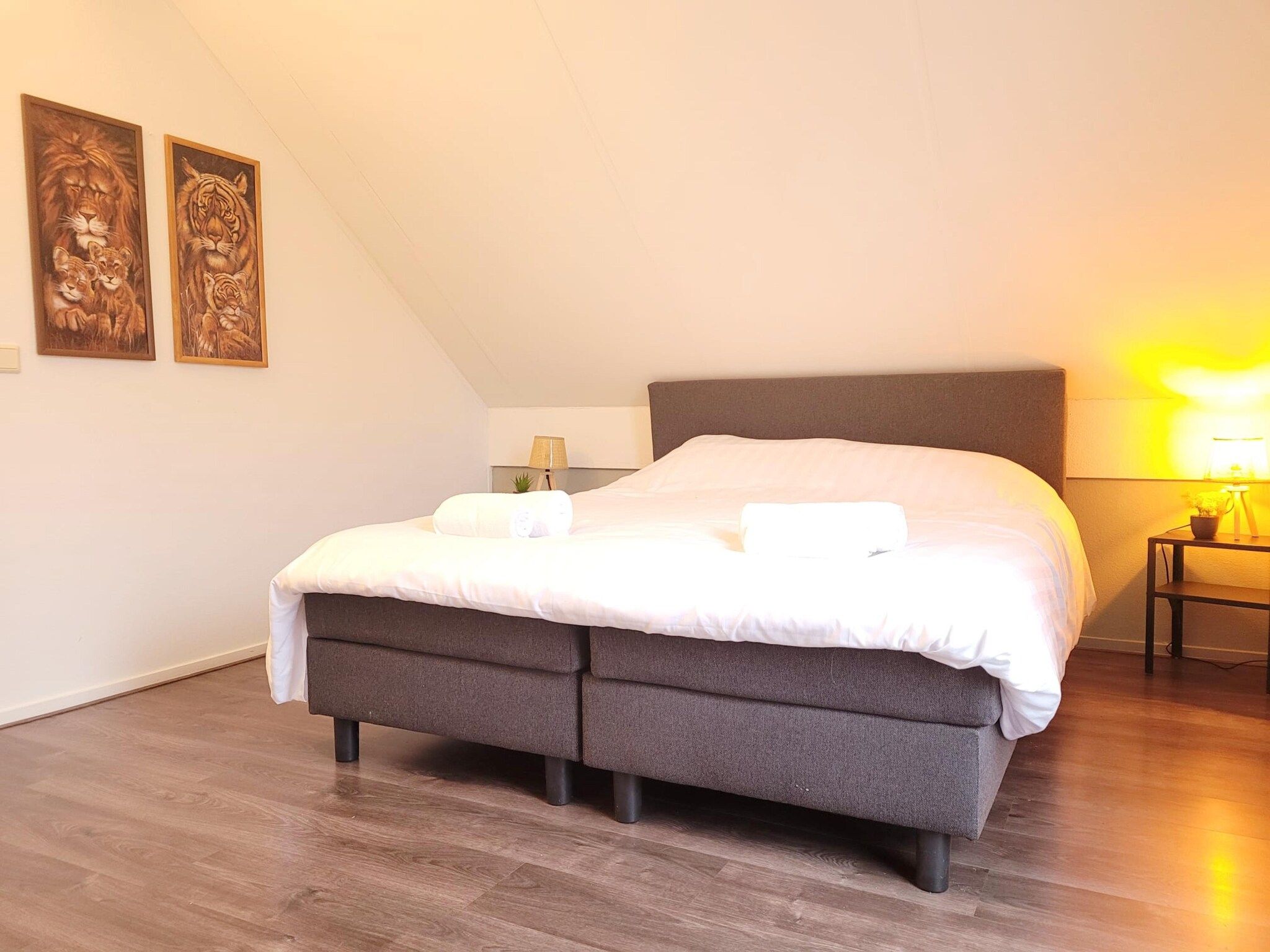 Een slaapkamer van 6 - Persons Forest Bungalow (copy) in Ewijk