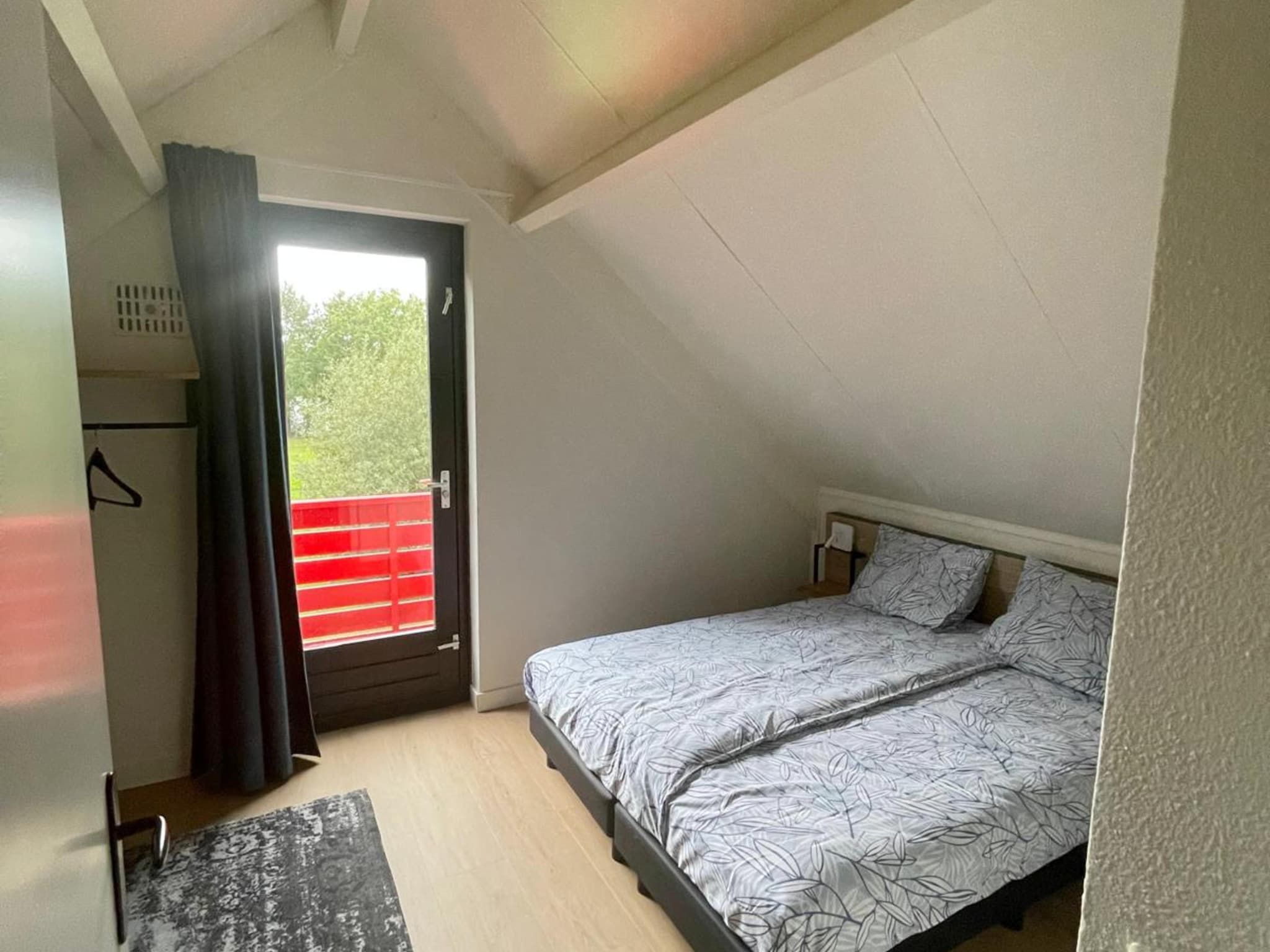 Een slaapkamer van 6 - Persons Lakeside Bungalow (copy) in Ewijk