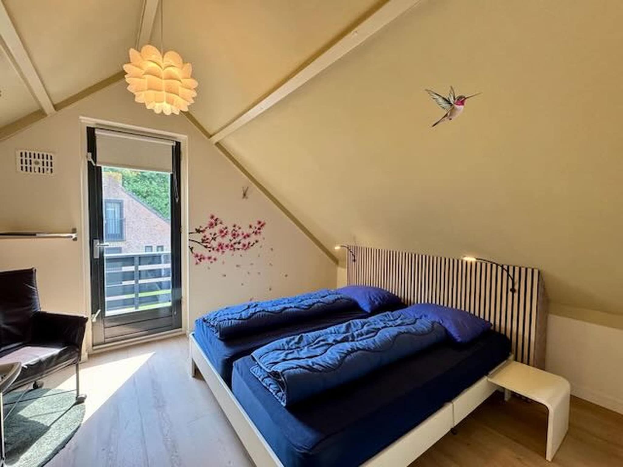 Een slaapkamer van 6 - Persons Forest VIP Bungalow (copy) in Ewijk