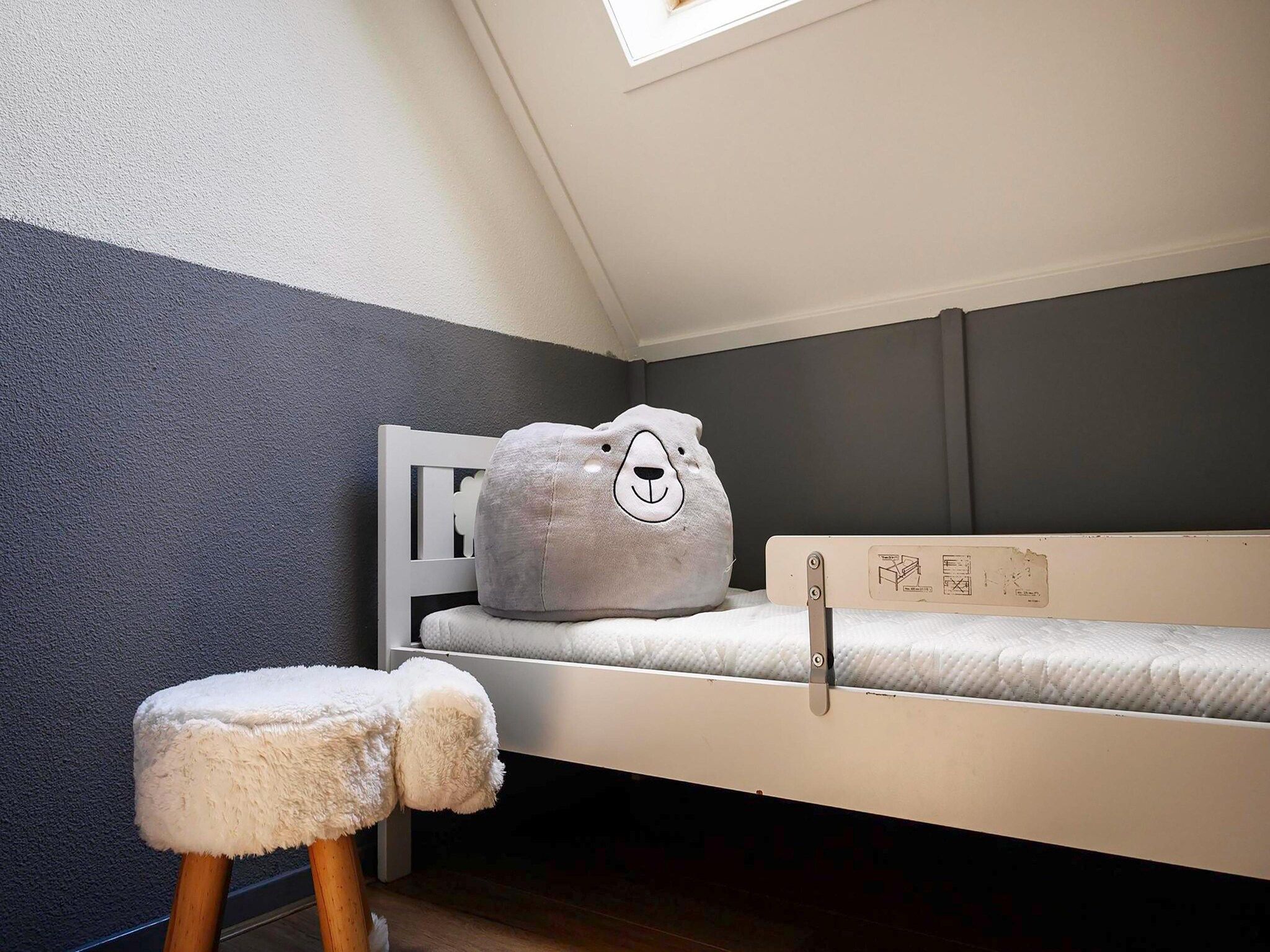 Een slaapkamer van 6 pers. Vosseberghuis Prestige met buitenspa in Vlagtwedde