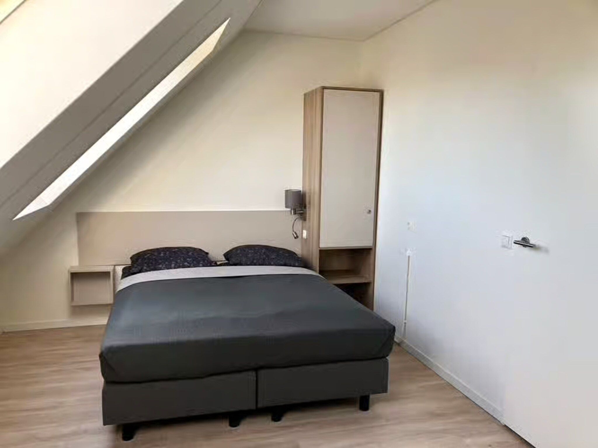 Een slaapkamer van Plein 40 Lodge 8 in Zoutelande