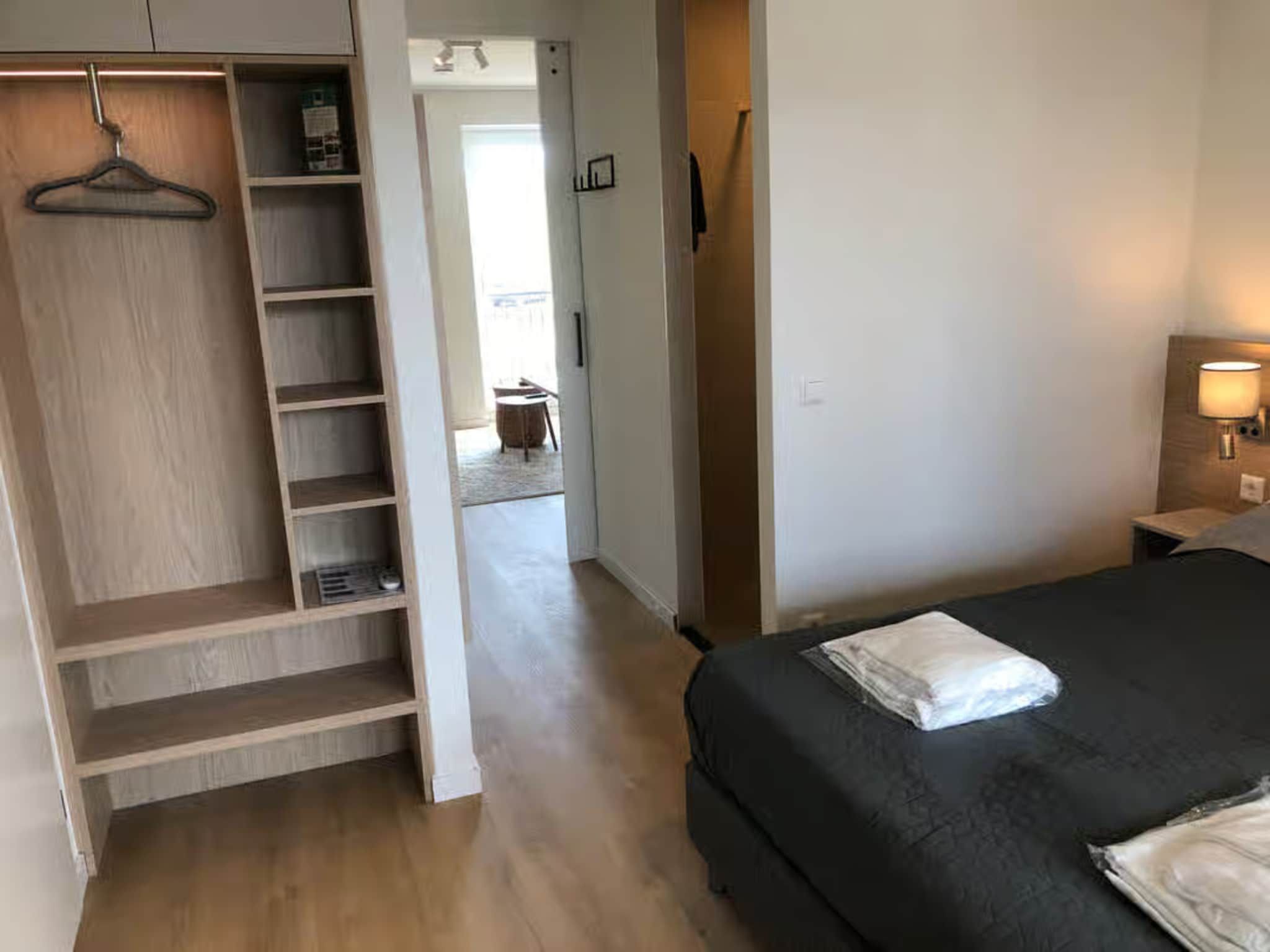 Een slaapkamer van Plein 40 Lodge 11 - New in Zoutelande