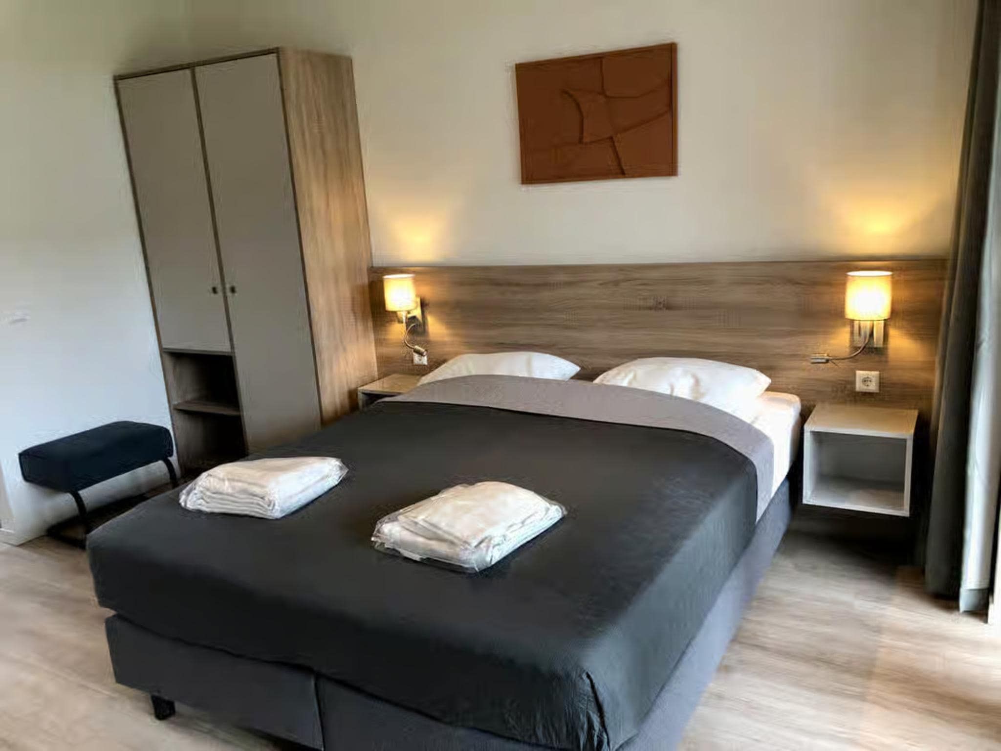 Een slaapkamer van Plein 40 Lodge 16 in Zoutelande