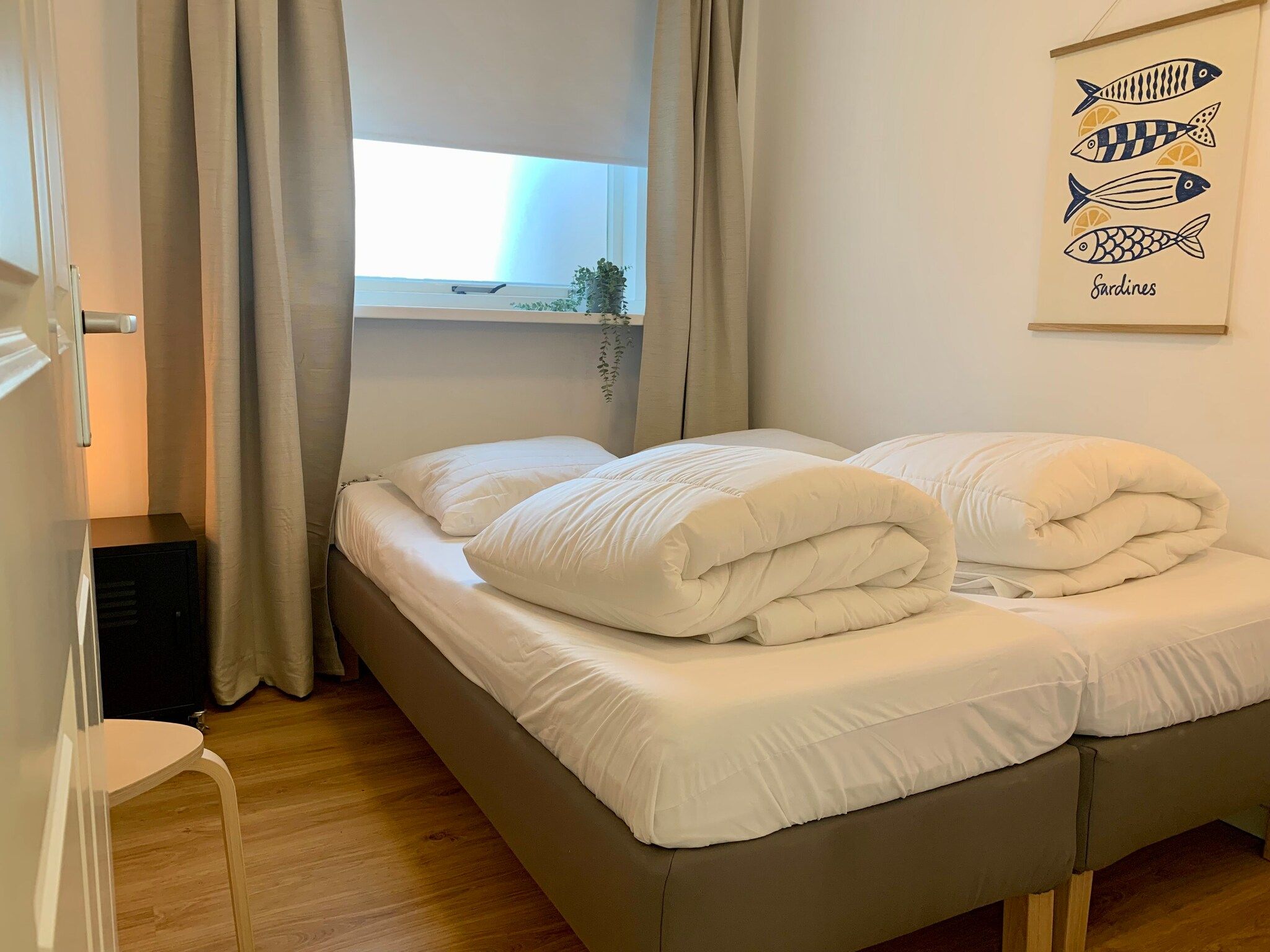 Een slaapkamer van Plein 1945-8 in Sint Maartenszee