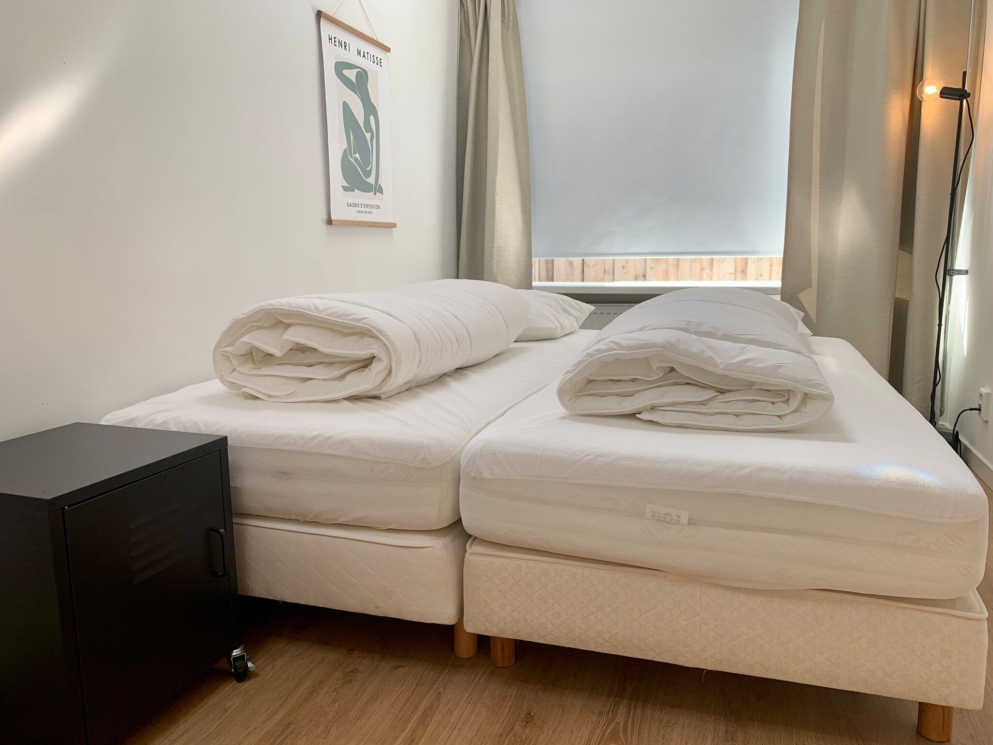 Een slaapkamer van Plein 1945-8 in Sint Maartenszee