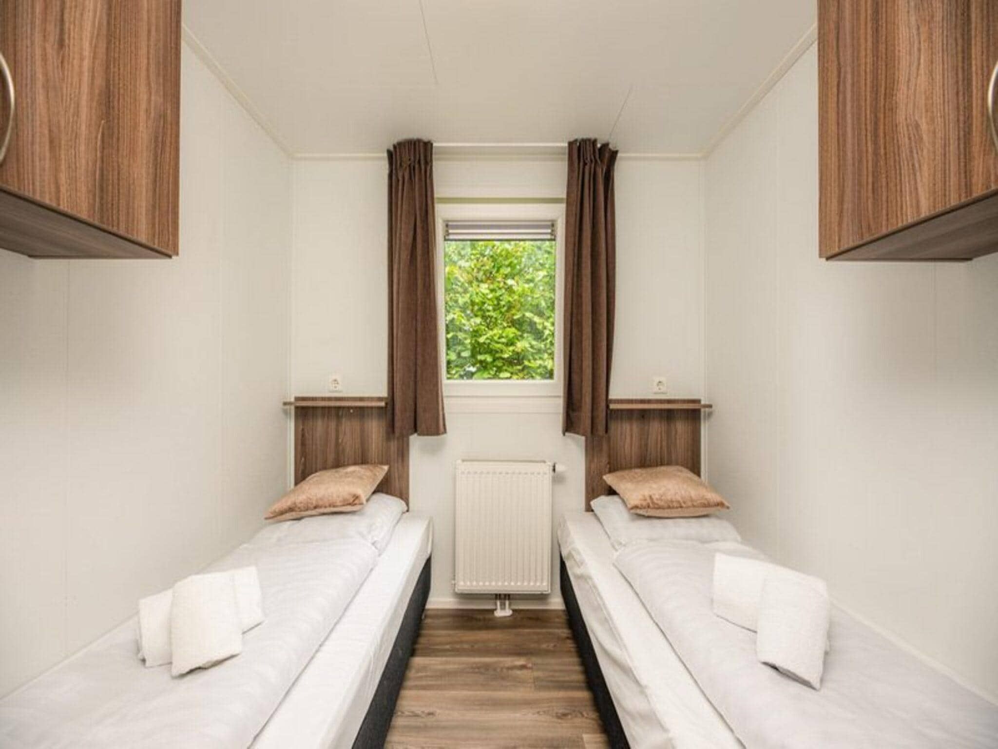 Een slaapkamer van Forest lodge | 6 people in Rijssen